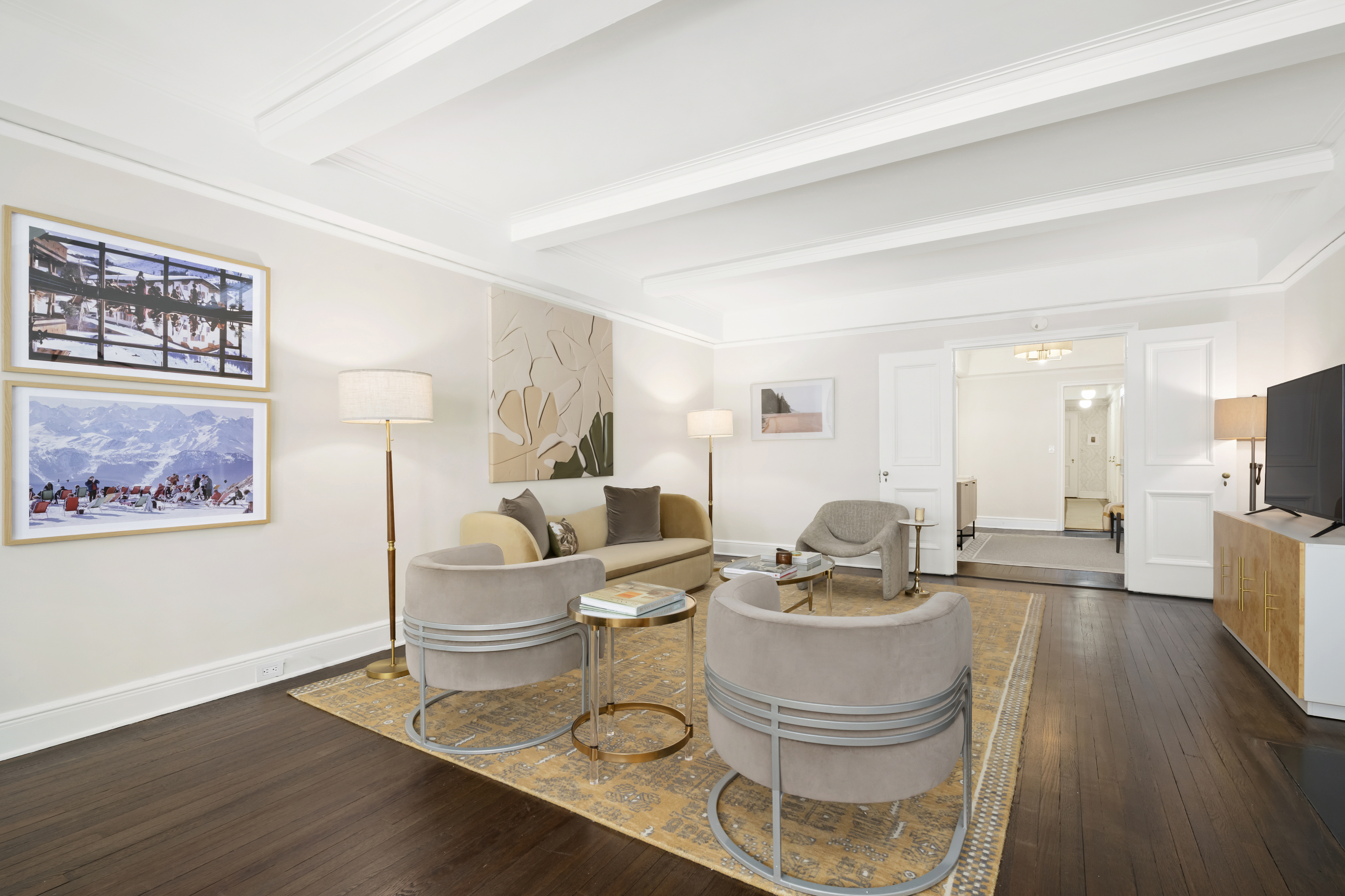 320 East 72nd Street, Unit 6A Manhattan, NY 10021 - Photo 3 of 13 a living room with furniture and wooden floor