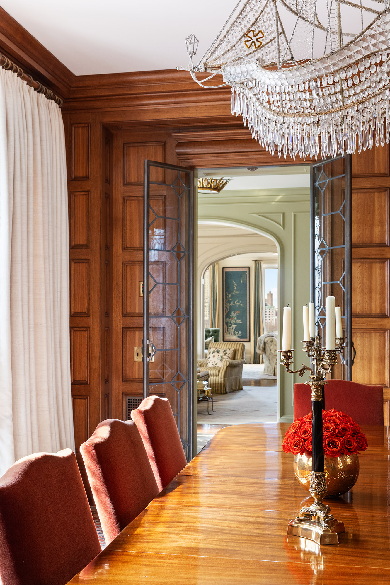 953 5th Avenue, Unit PH Manhattan, NY 10075 - Photo 9 of 27 a living room with furniture and a large window