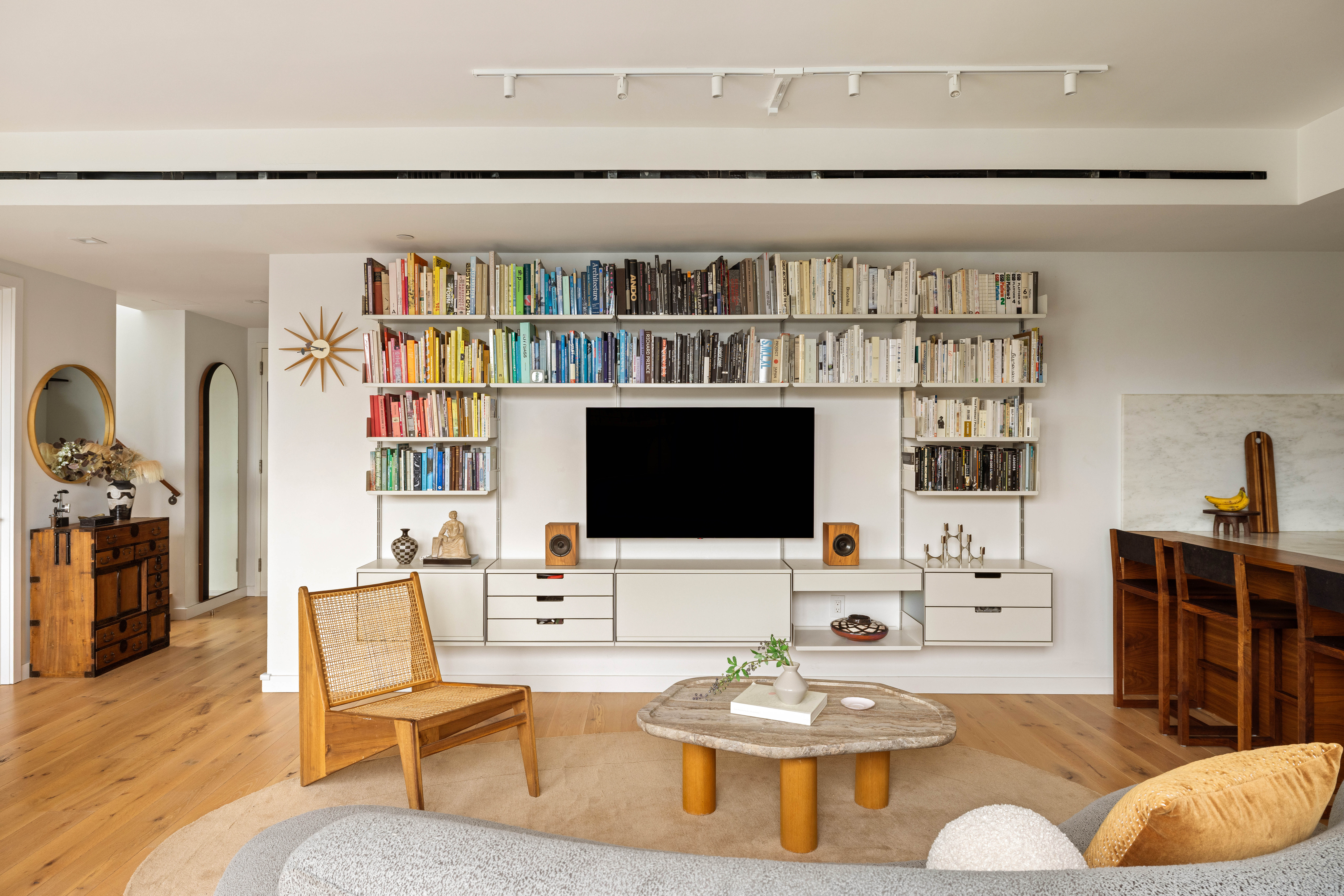 280 Saint Marks Avenue, Unit PHG Brooklyn, NY 11238 - Photo 4 of 14 a living room with furniture and a flat screen tv