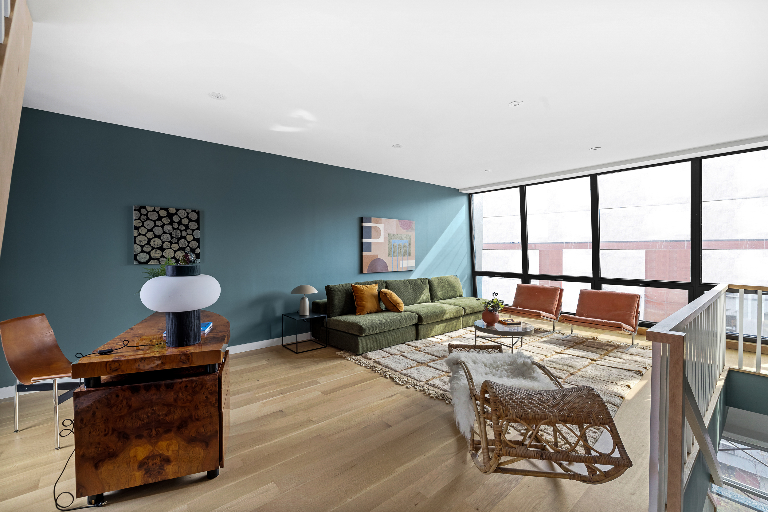 325 Bowery, Unit PH Manhattan, NY 10003 - Photo 12 of 17 a living room with furniture and a window