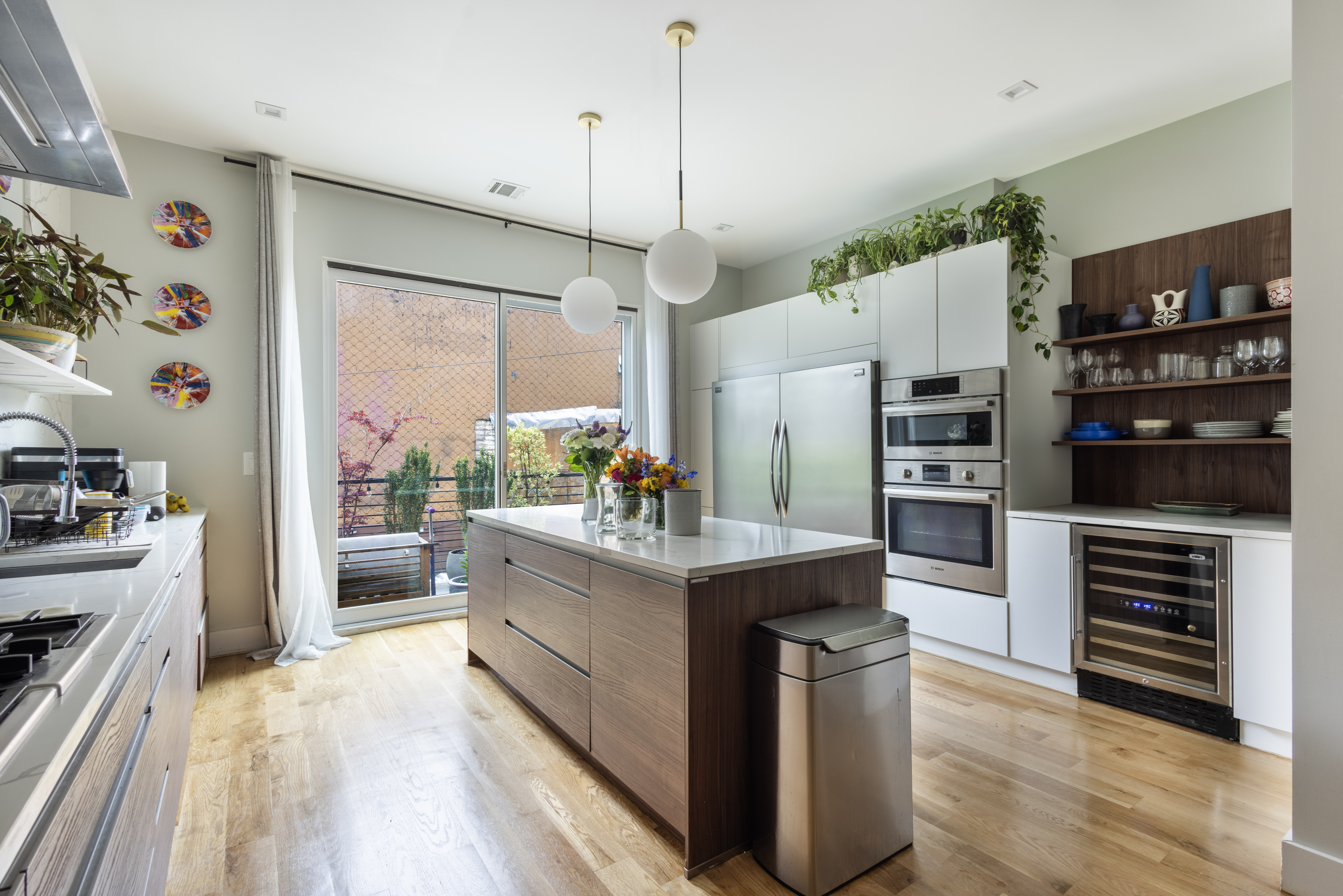 97 A Cooper Street Brooklyn, NY 11207 - Photo 1 of 16 a kitchen with stainless steel appliances granite countertop a stove and a refrigerator