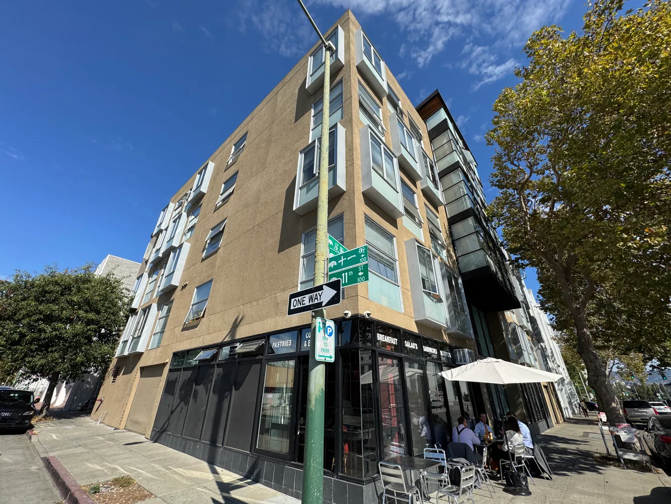 a view of a building with a street