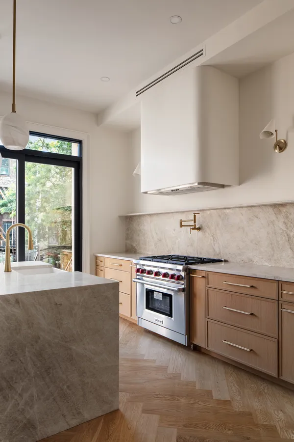 a view of a hallway with stairs