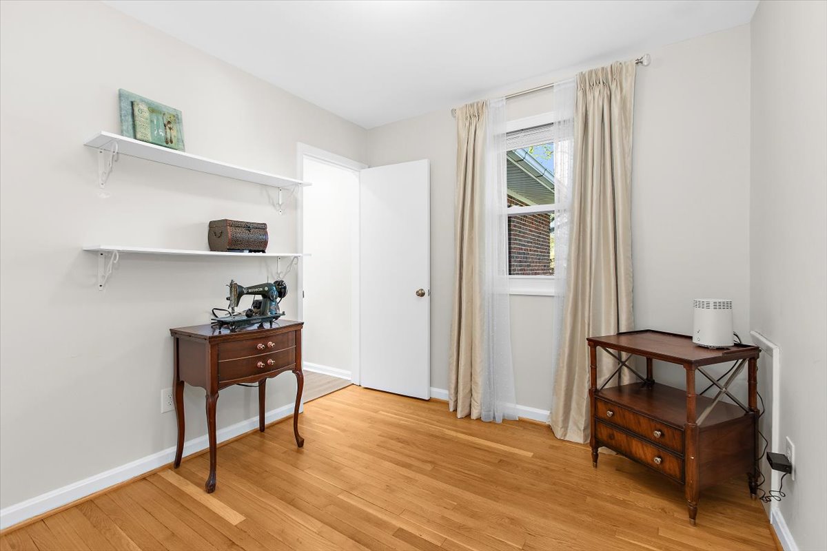 12712 Atherton Drive Silver Spring, MD 20906 - Photo 19 of 40 a living room with furniture and a wooden floor