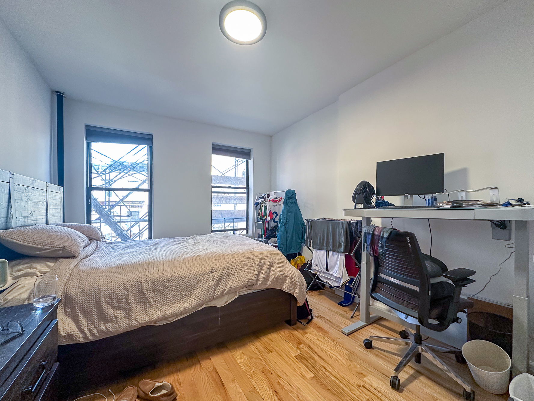 342 East 9th Street, Unit 3B Manhattan, NY 10003 - Photo 2 of 9 a bedroom with a bed and a window