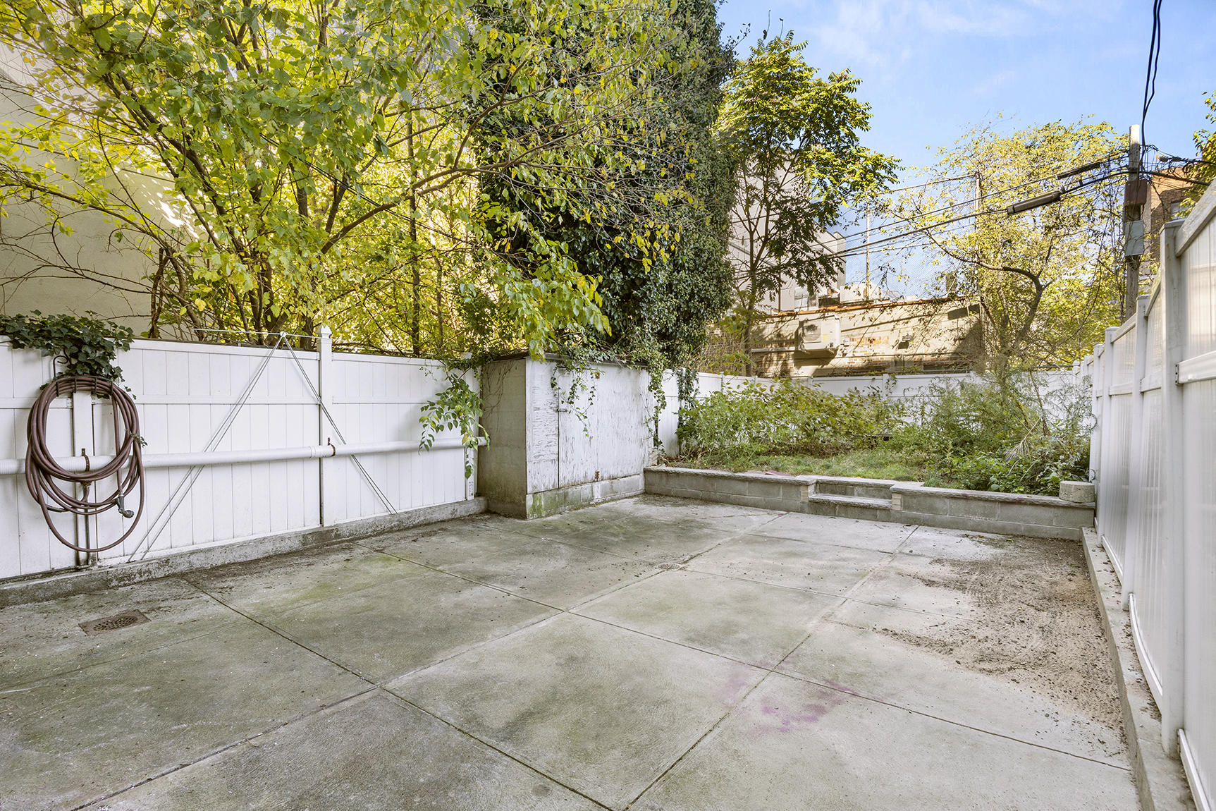 1437 Lincoln Place Brooklyn, NY 11213 - Photo 4 of 12 a view of backyard and tree