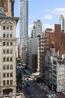 a city view with tall buildings
