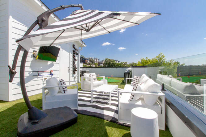 1203 Brick Church Pike Nashville, TN 37207 - Photo 31 of 44 a view of a patio with couches chairs and a fire pit