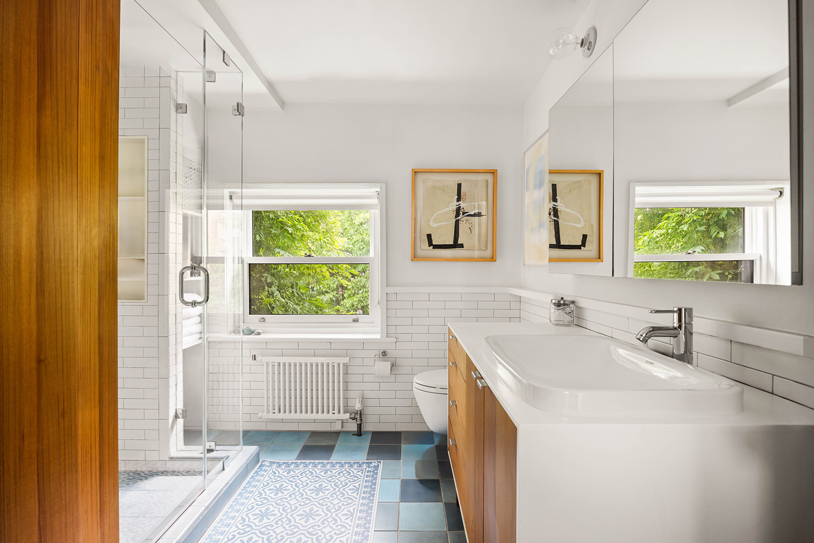 298 State Street Brooklyn, NY 11201 - Photo 17 of 21 a bathroom with a sink a bathtub and a window