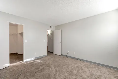 an empty room with an entryway
