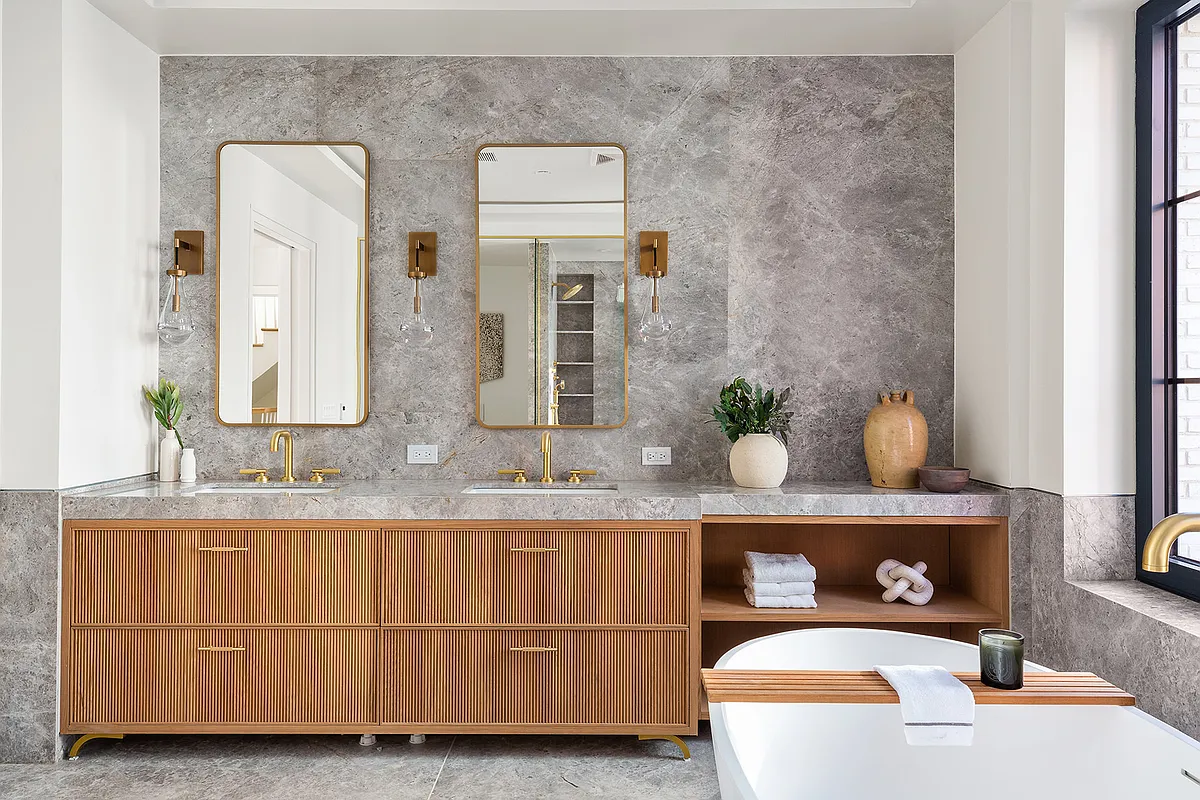 537 Pacific Street Brooklyn, NY 11217 - Photo 16 of 25 a bathroom with a sink and a mirror