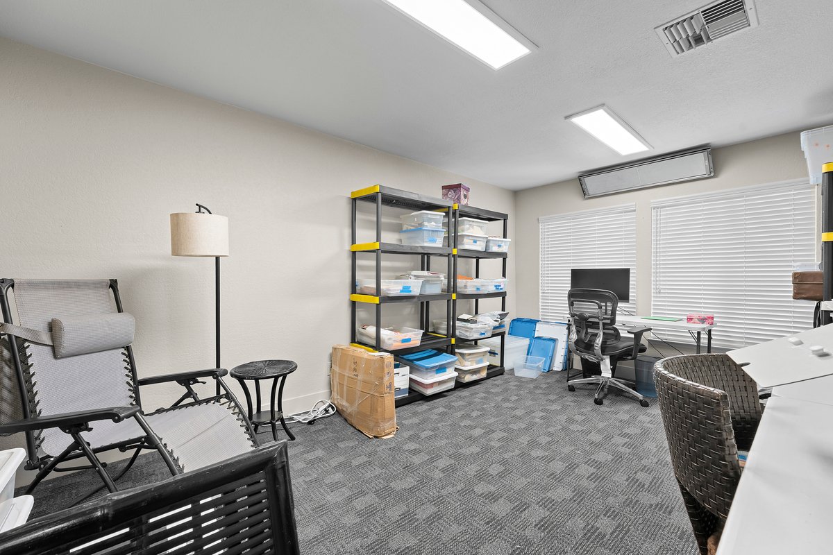 625 Highway 50 Zephyr Cove, NV 89448 - Photo 25 of 38 a living room with furniture and a flat screen tv