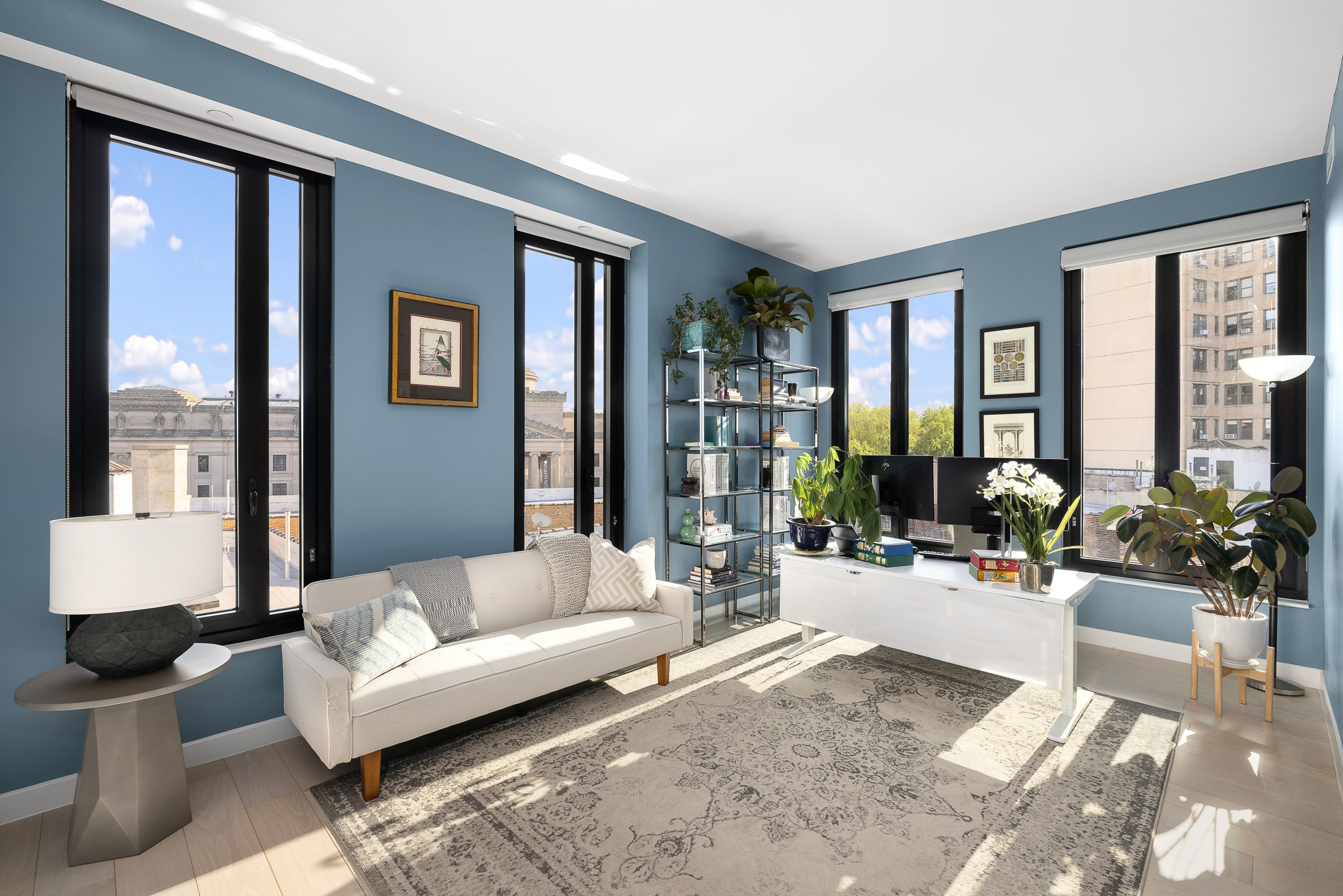 856 Washington Avenue, Unit 9A Brooklyn, NY 11238 - Photo 10 of 25 a living room with furniture and large windows