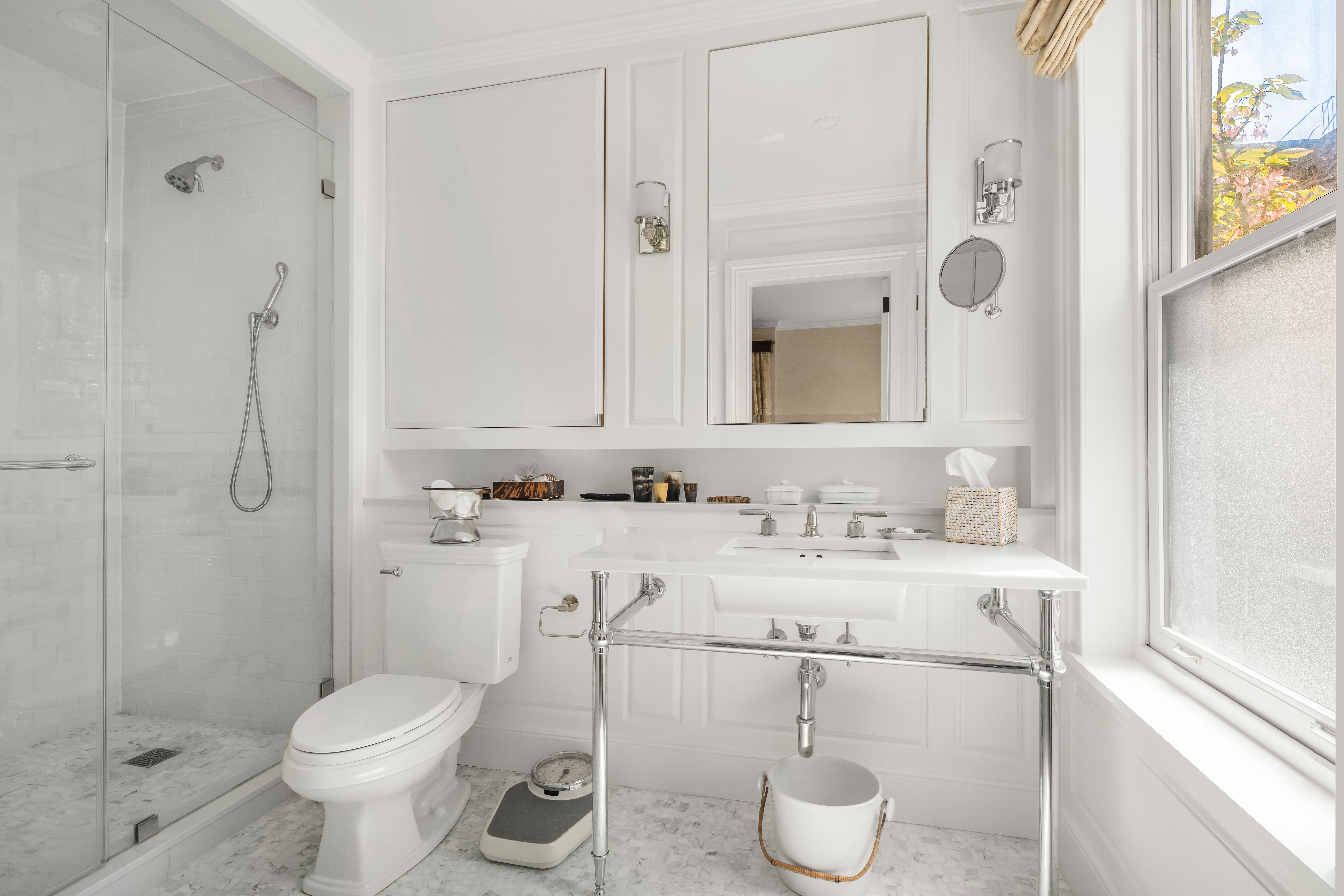 204 Warren Street Brooklyn, NY 11201 - Photo 10 of 29 a bathroom with a granite countertop toilet sink and mirror