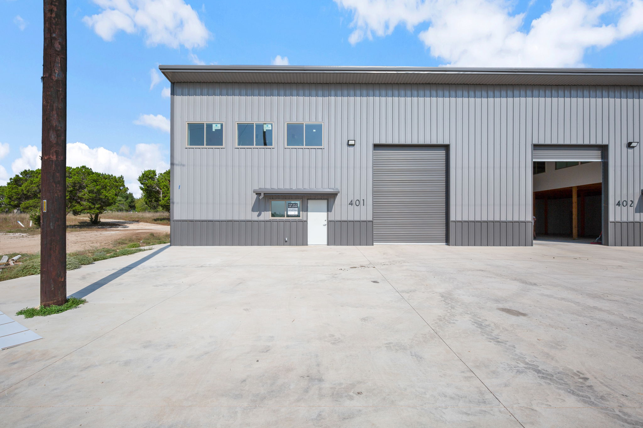 10020 Darden Hill Road, Unit 401 Austin, TX 78737 - Photo 3 of 50 a view of a house with a yard
