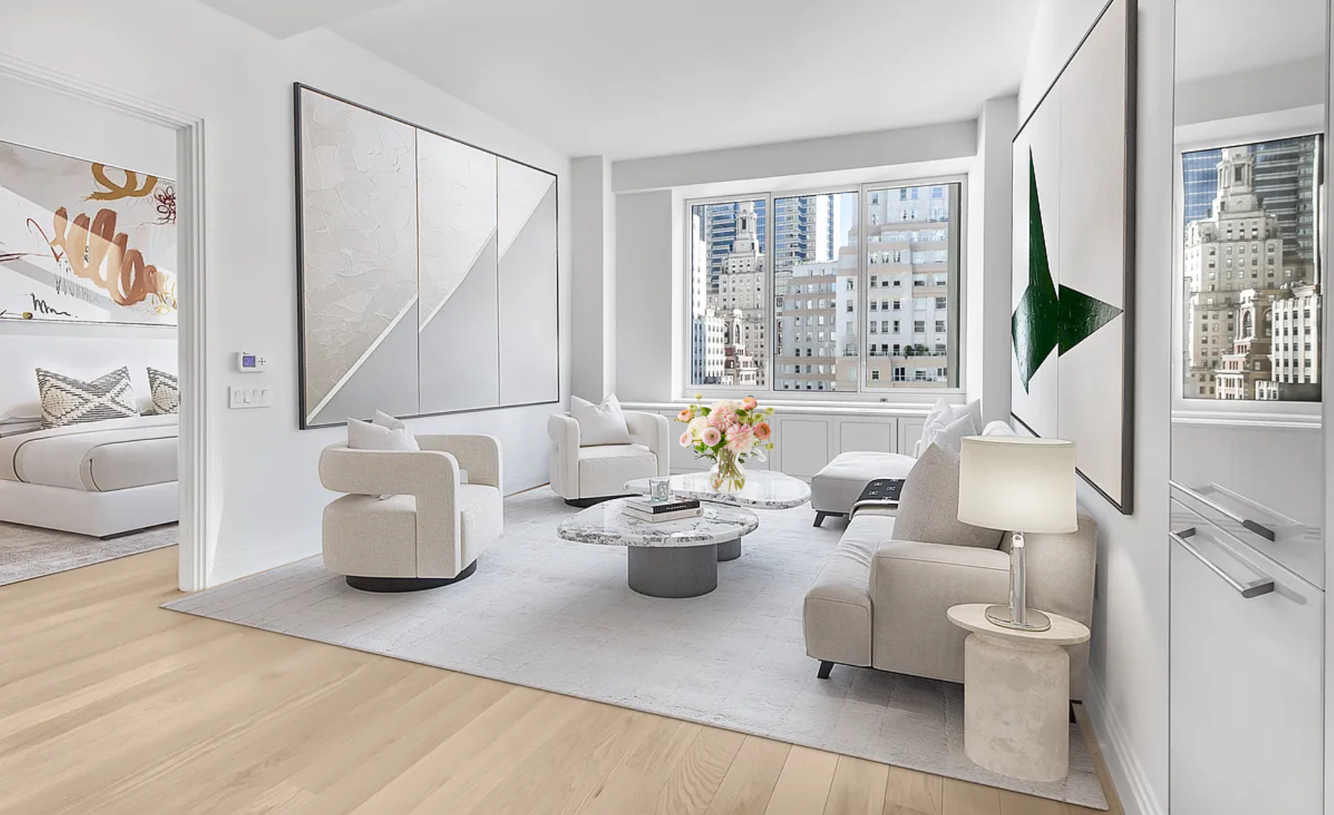 1 Wall Street, Unit 2512 Manhattan, NY 10005 - Photo 1 of 31 a living room with furniture and a large window