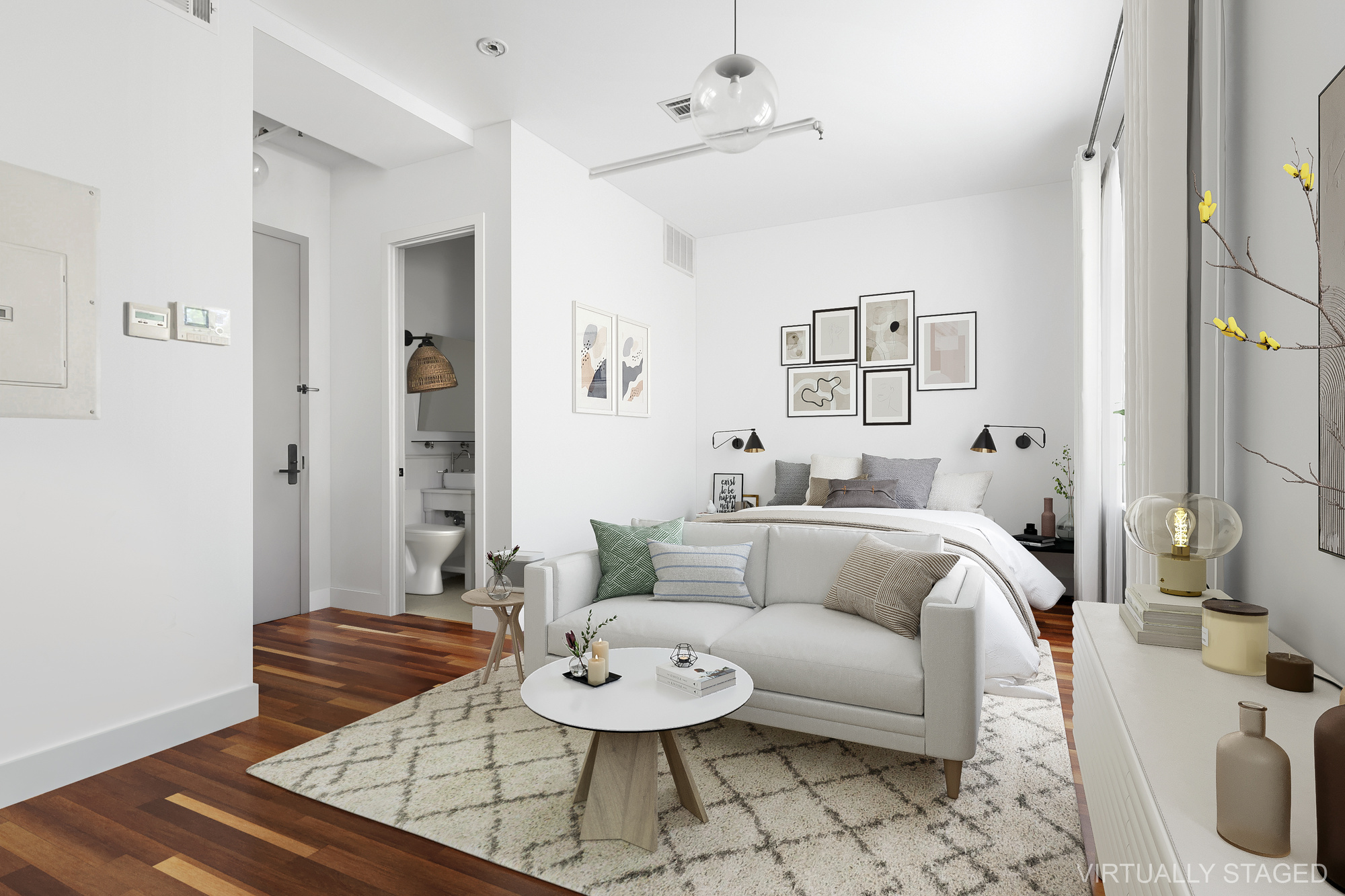 180 Bainbridge Street, Unit 111 Brooklyn, NY 11233 - Photo 2 of 25 a living room with furniture and a rug