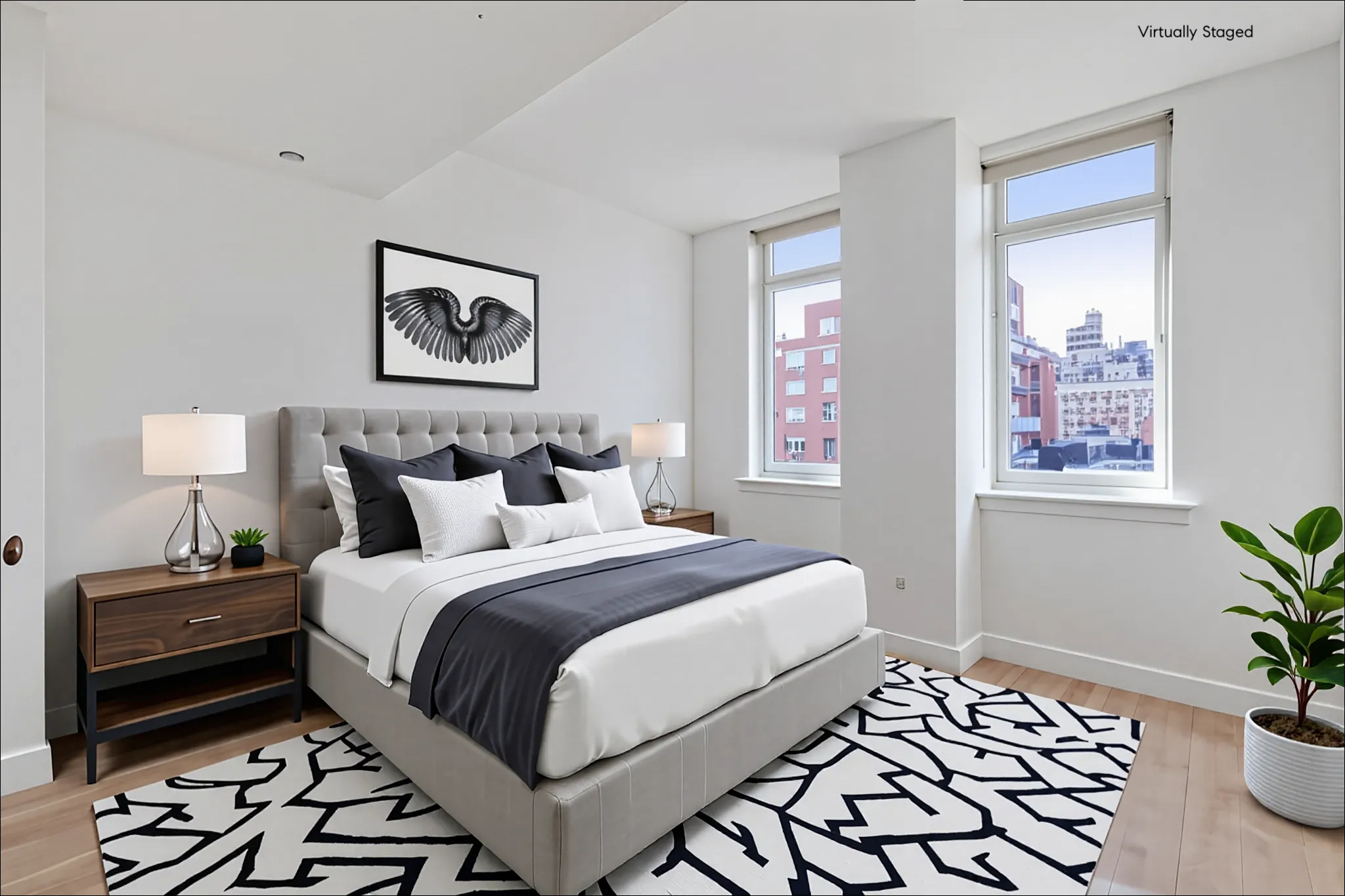 2300 Frederick Douglass Boulevard, Unit 8D Manhattan, NY 10027 - Photo 1 of 11 a bedroom with a bed and a potted plant