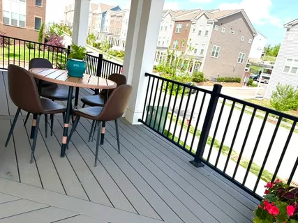 a view of balcony with furniture