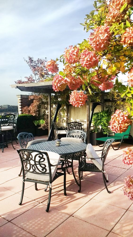 645 West End Avenue, Unit 11D Manhattan, NY 10025 - Photo 18 of 21 a view of a tables and chairs in patio