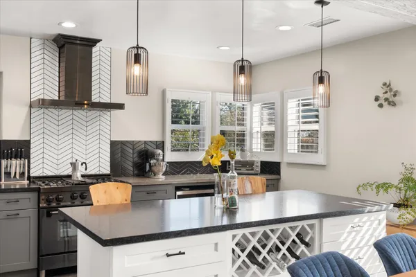 a bedroom with bed and window