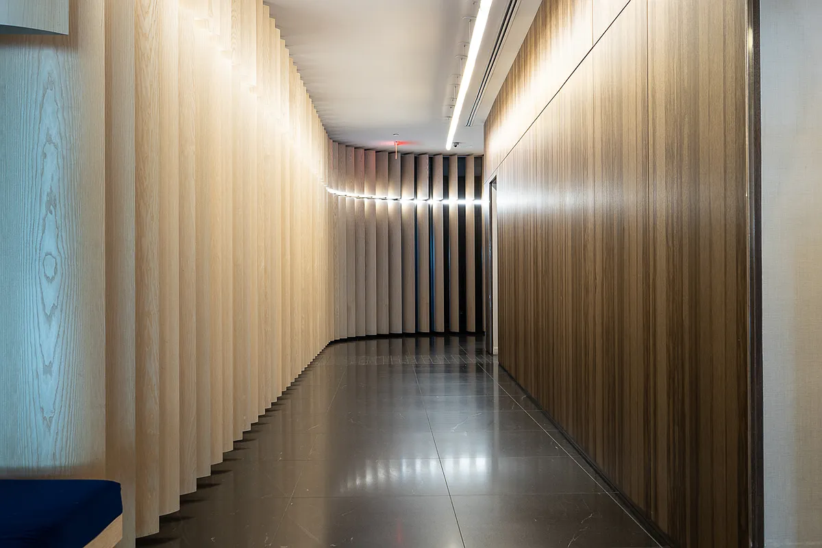 385 1st Avenue, Unit 10G Manhattan, NY 10010 - Photo 11 of 22 a view of a hallway with wooden floor