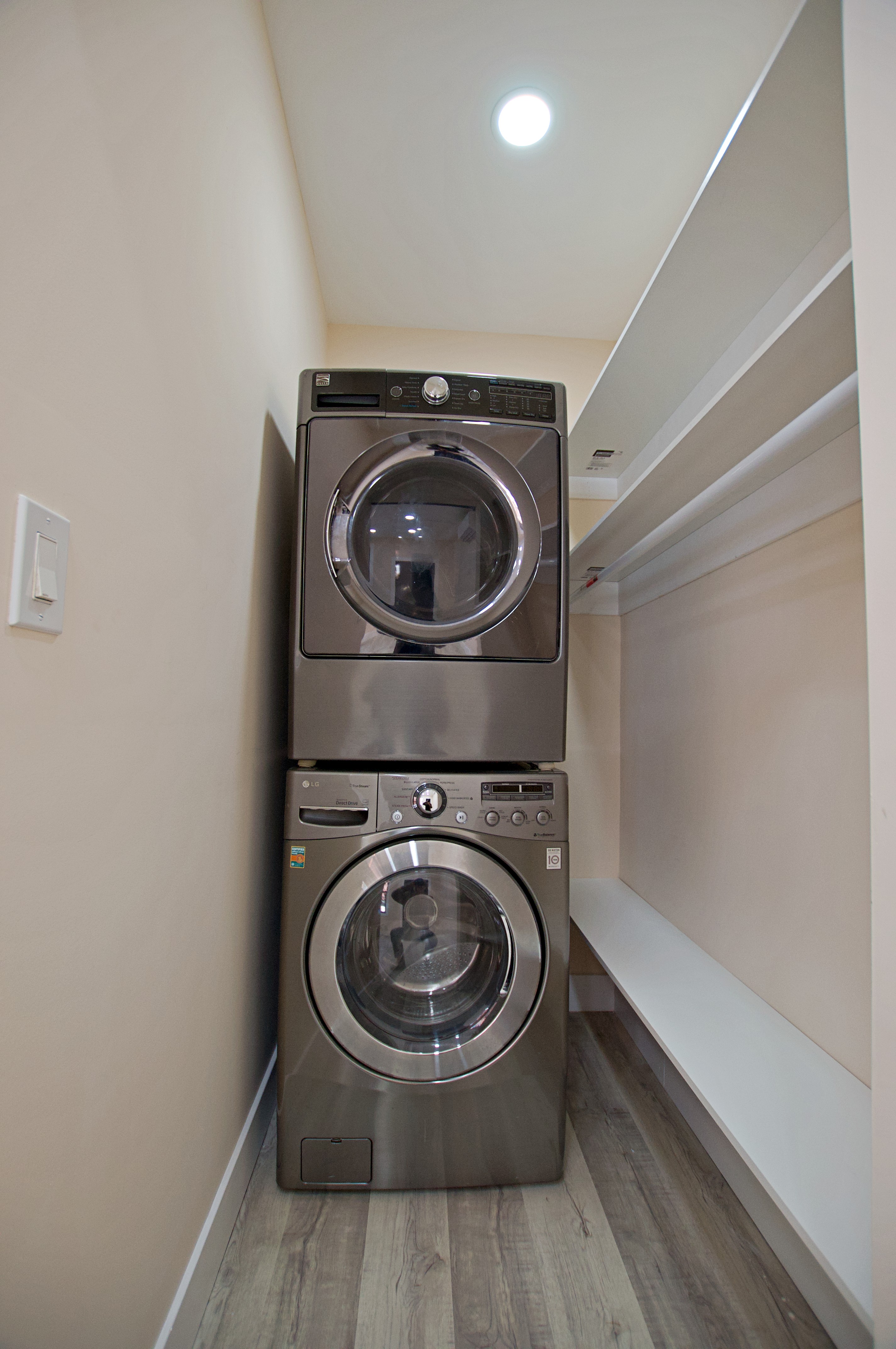 220 Madison Street, Unit 1A Brooklyn, NY 11216 - Photo 8 of 9 a utility room with dryer and washer