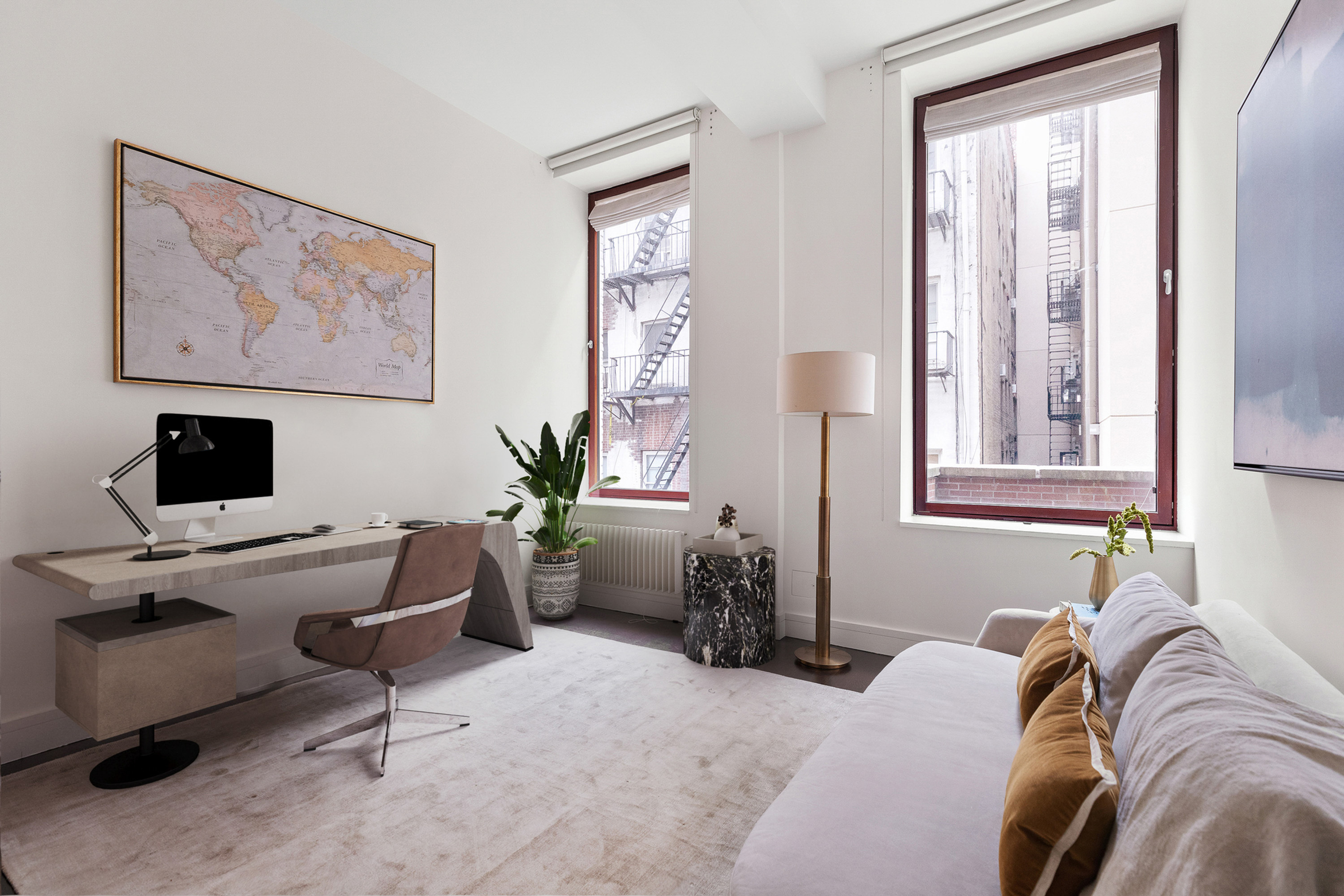 388 West Broadway, Unit 2 Manhattan, NY 10012 - Photo 24 of 27 a view of a livingroom with workspace and a window
