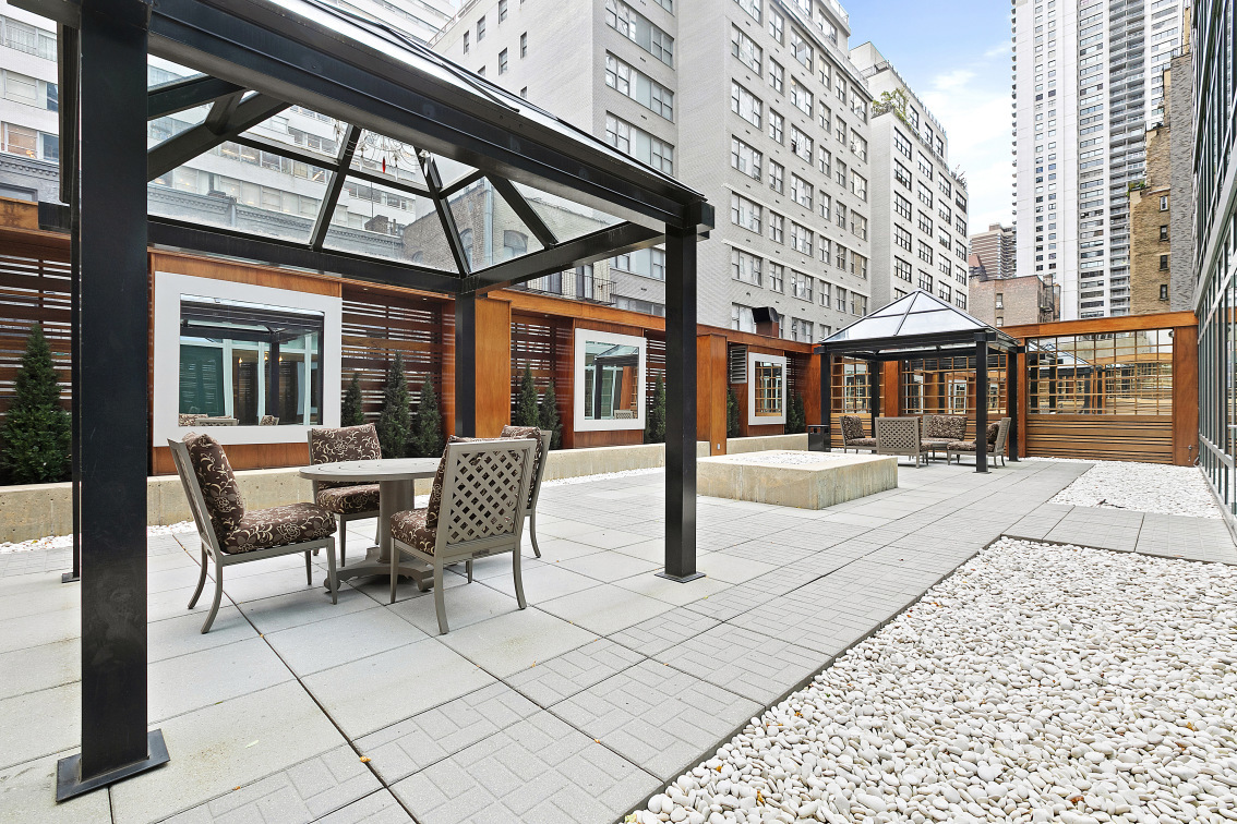 207 East 57th Street, Unit 34A Manhattan, NY 10022 - Photo 20 of 22 a outdoor space view with a sitting space