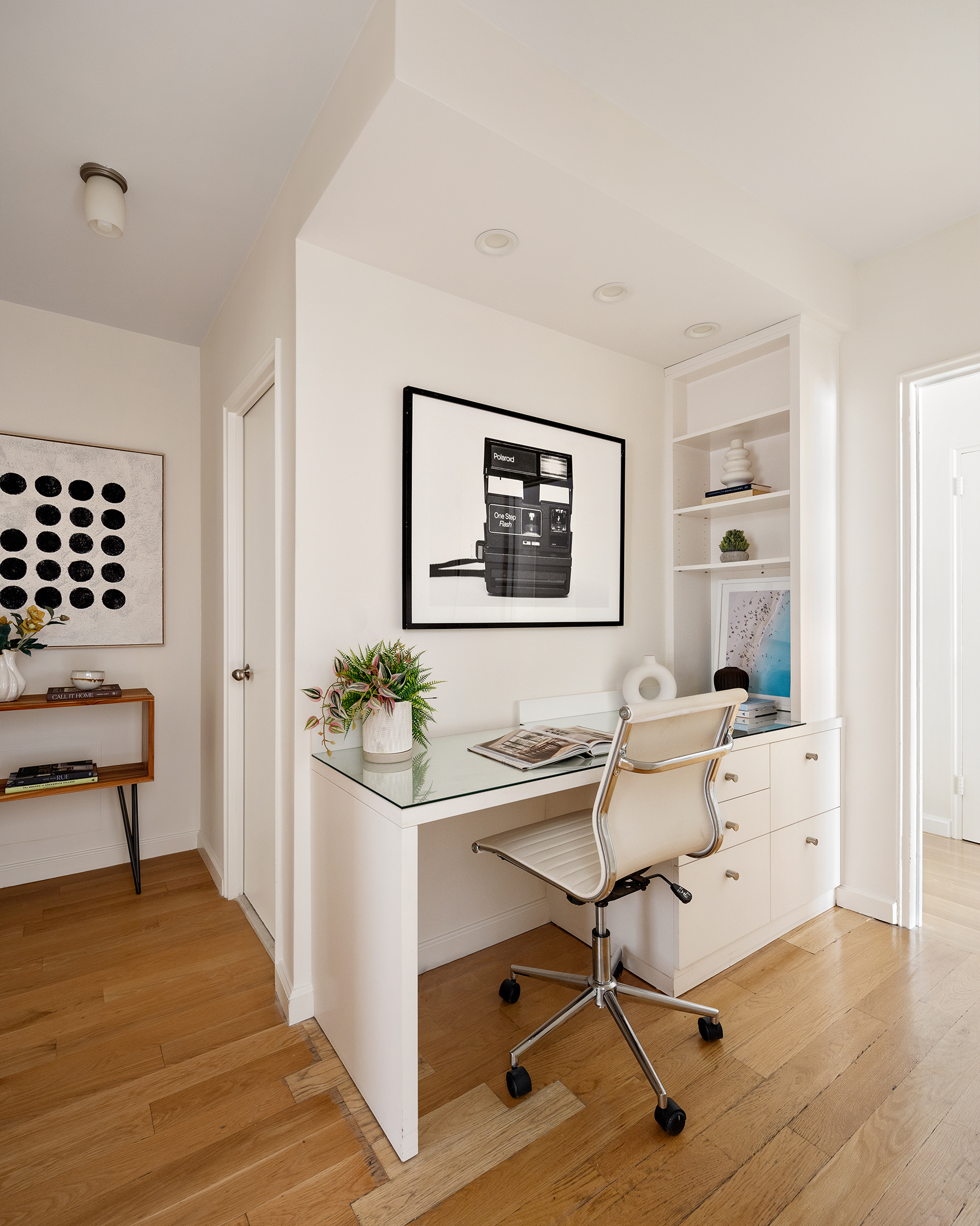 180 East End Avenue, Unit 1C Manhattan, NY 10128 - Photo 6 of 19 a workspace with furniture and window