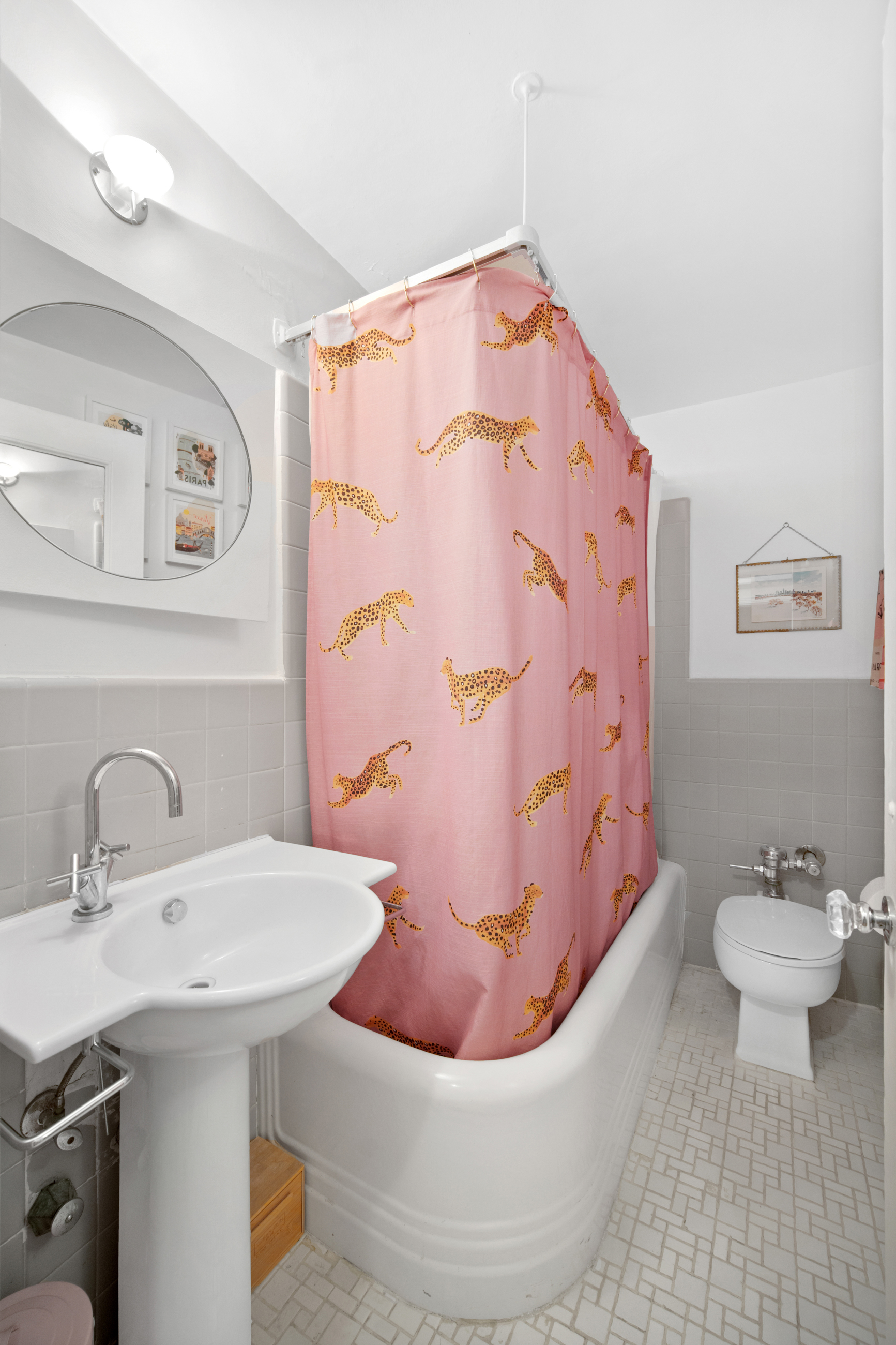 110 East 87th Street, Unit 3F Manhattan, NY 10128 - Photo 7 of 8 a bathroom with a sink toilet and shower