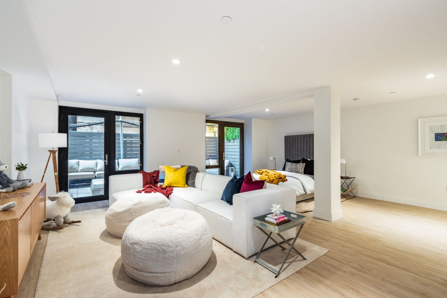 106 Franklin Street, Unit MAIS Manhattan, NY 10013 - Photo 7 of 16 a living room with furniture and a table