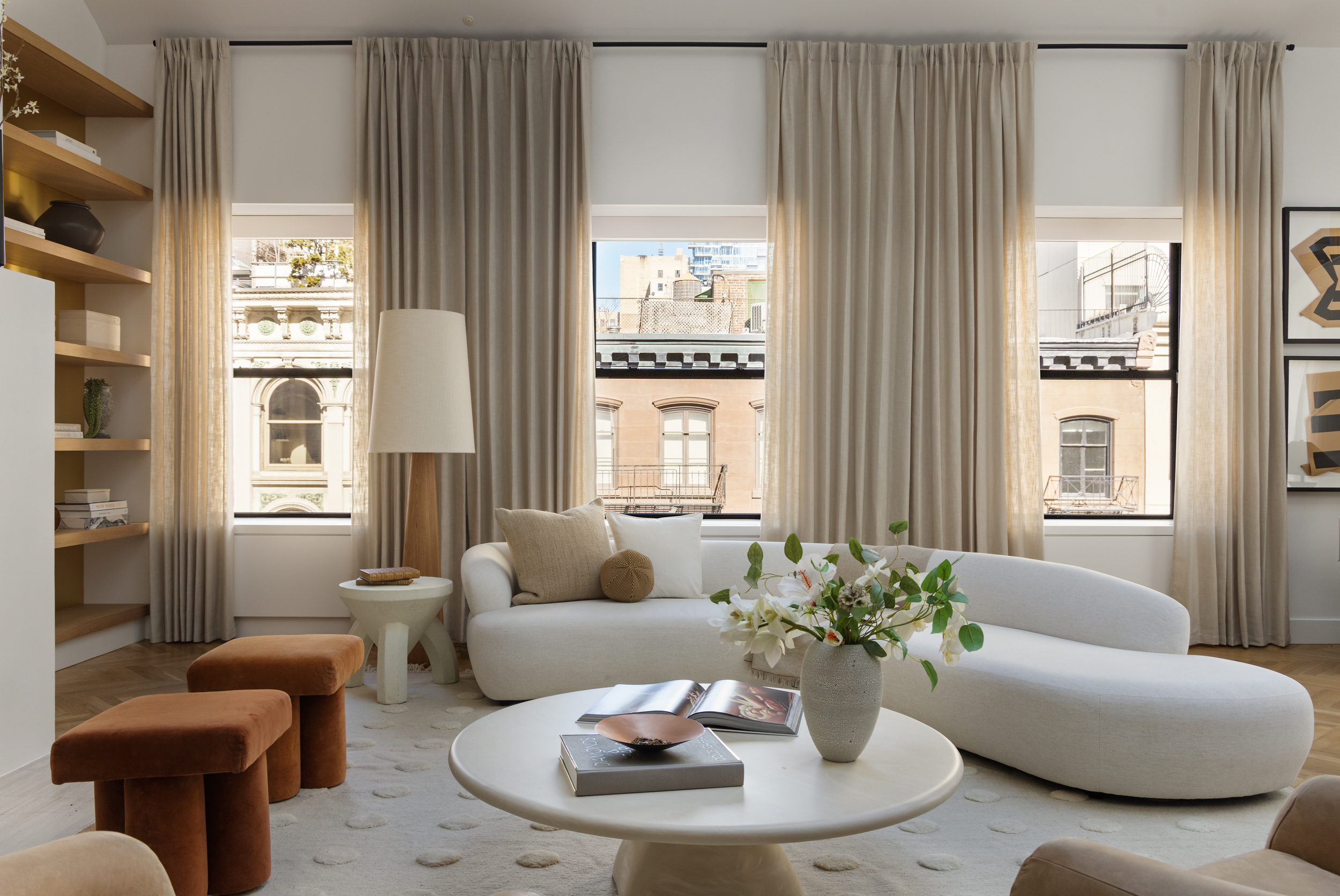 45 Warren Street, Unit PH Manhattan, NY 10007 - Photo 7 of 29 a living room with furniture and a large window