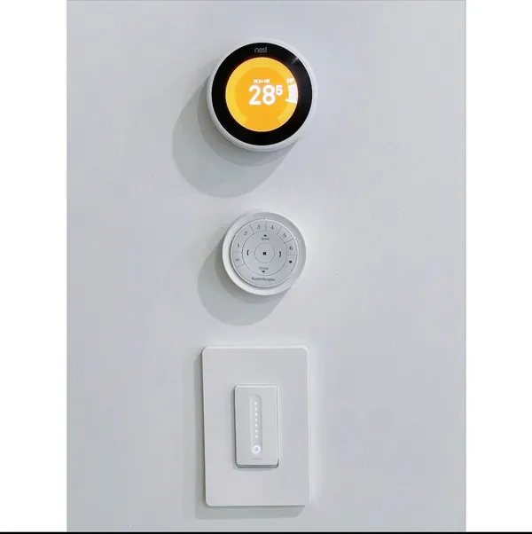 a view of a brick building next to a yard