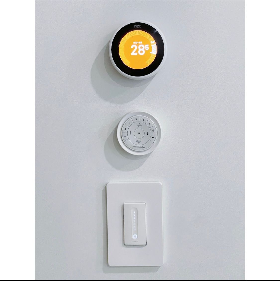 4507 Court Square, Unit 6A Queens, NY 11101 - Photo 14 of 19 a view of a hallway with a wall clock and a window