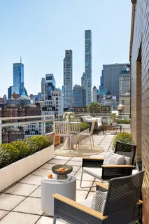 a view of a city with tall buildings