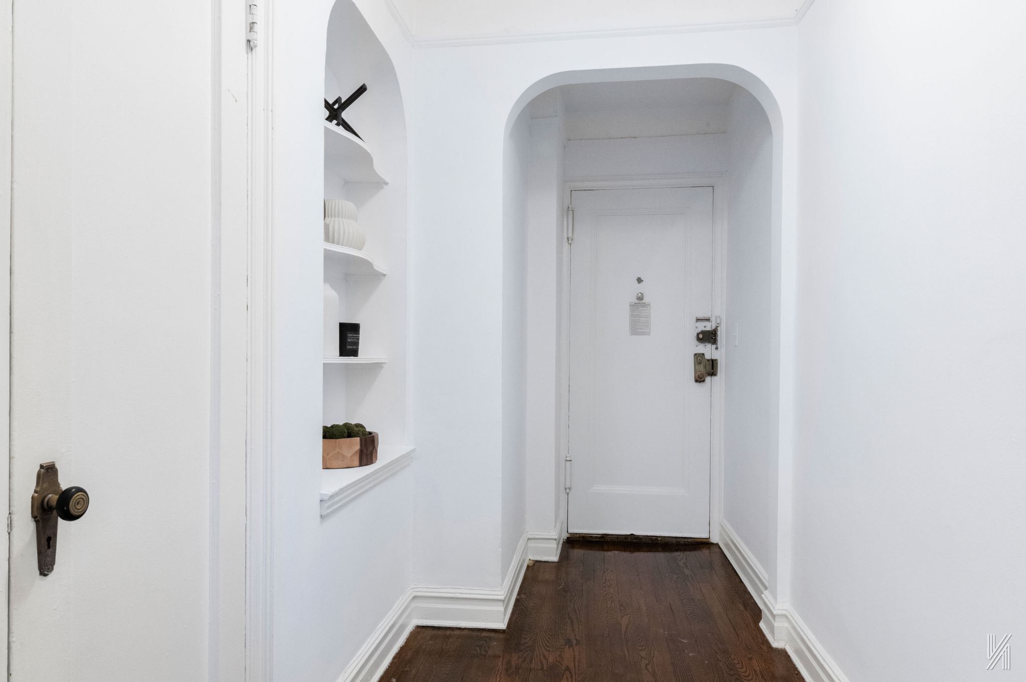 35-06 88th Street, Unit 5E Queens, NY 11372 - Photo 13 of 21 a view of a hallway with wooden floor and closet