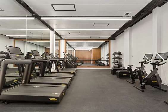 666 Greenwich Street, Unit 350 Manhattan, NY 10014 - Photo 10 of 13 a view of a room with gym equipment