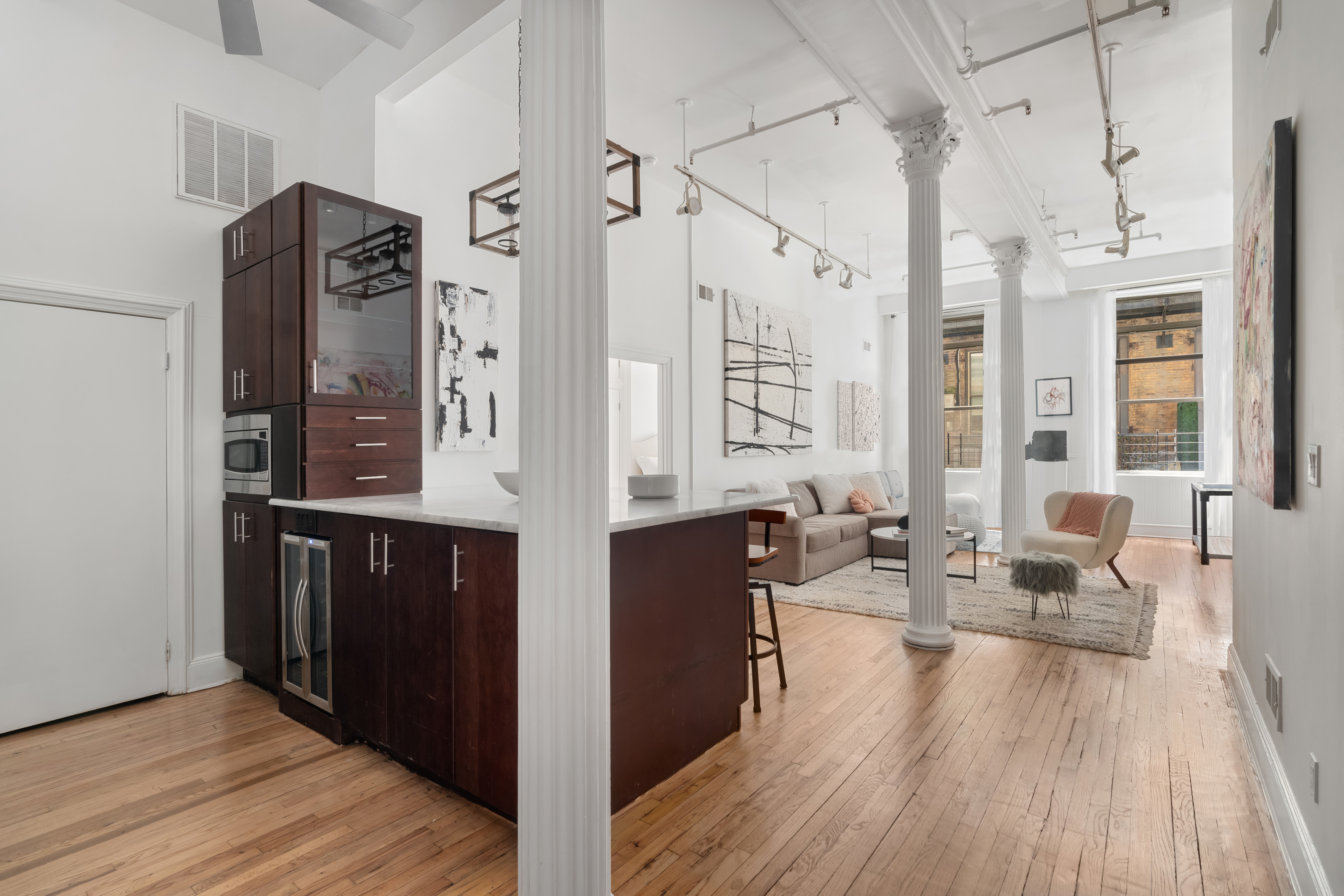 80 Leonard Street, Unit 3G Manhattan, NY 10013 - Photo 1 of 30 a living room with furniture