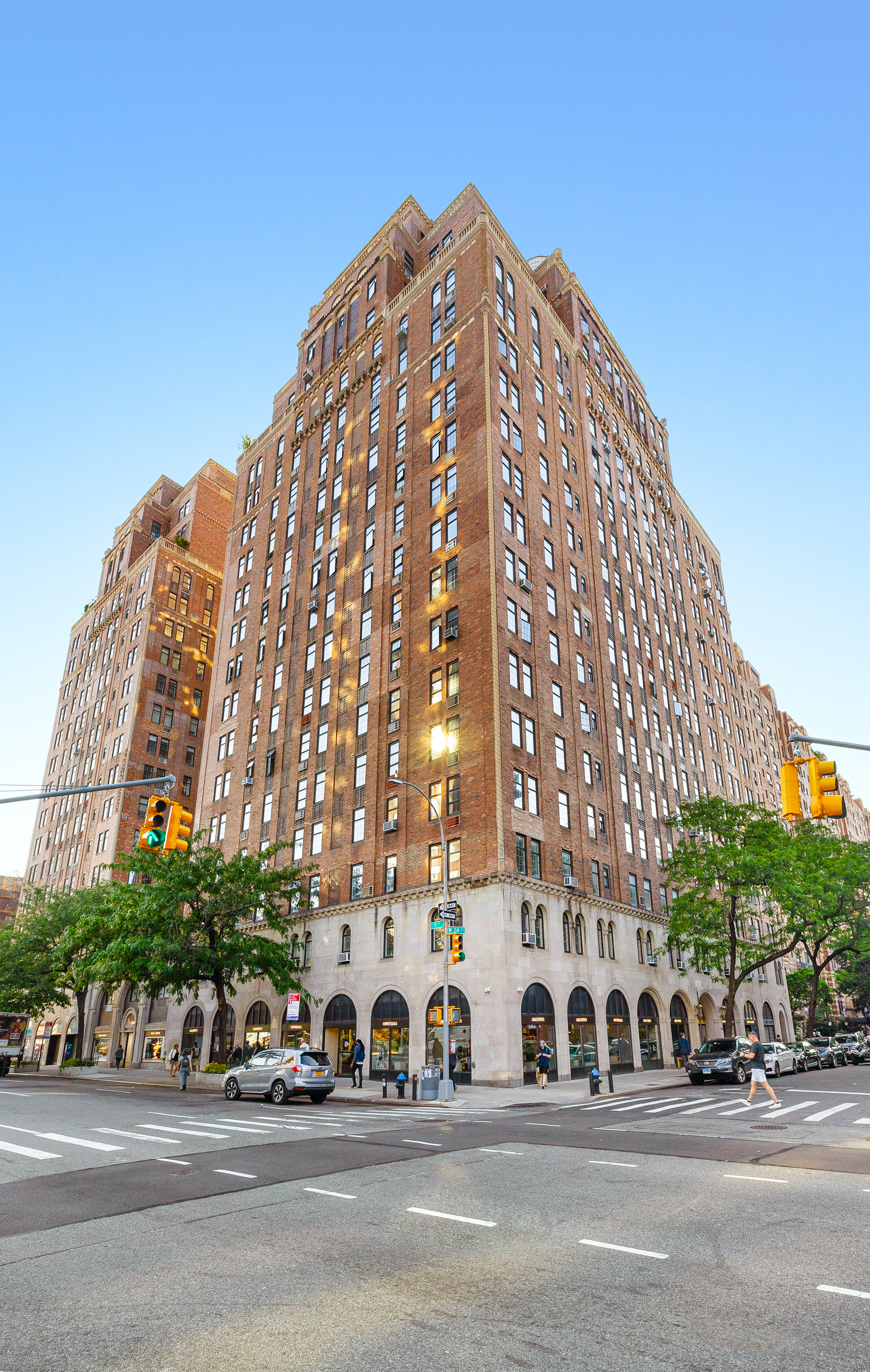 410 West 24th Street, Unit 8F Manhattan, NY 10011 - Photo 14 of 16 a view of a tall building next to a road
