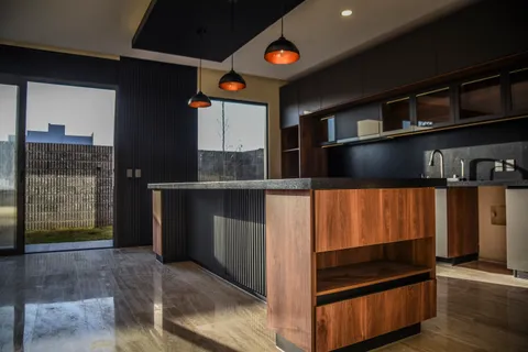 a view of a living room with a flat screen tv