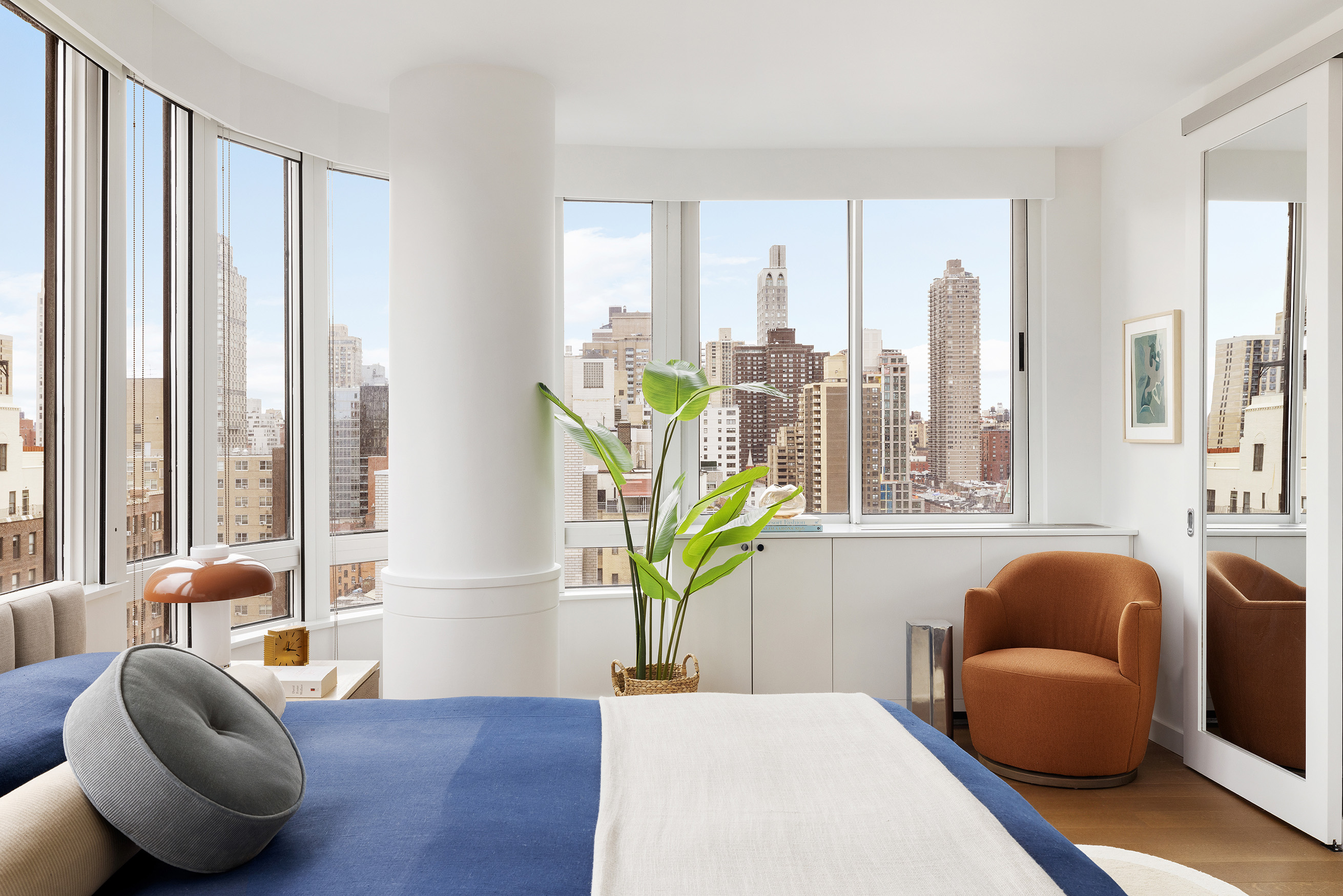 455 East 86th Street, Unit 20E Manhattan, NY 10028 - Photo 9 of 14 a living room with furniture and a large window