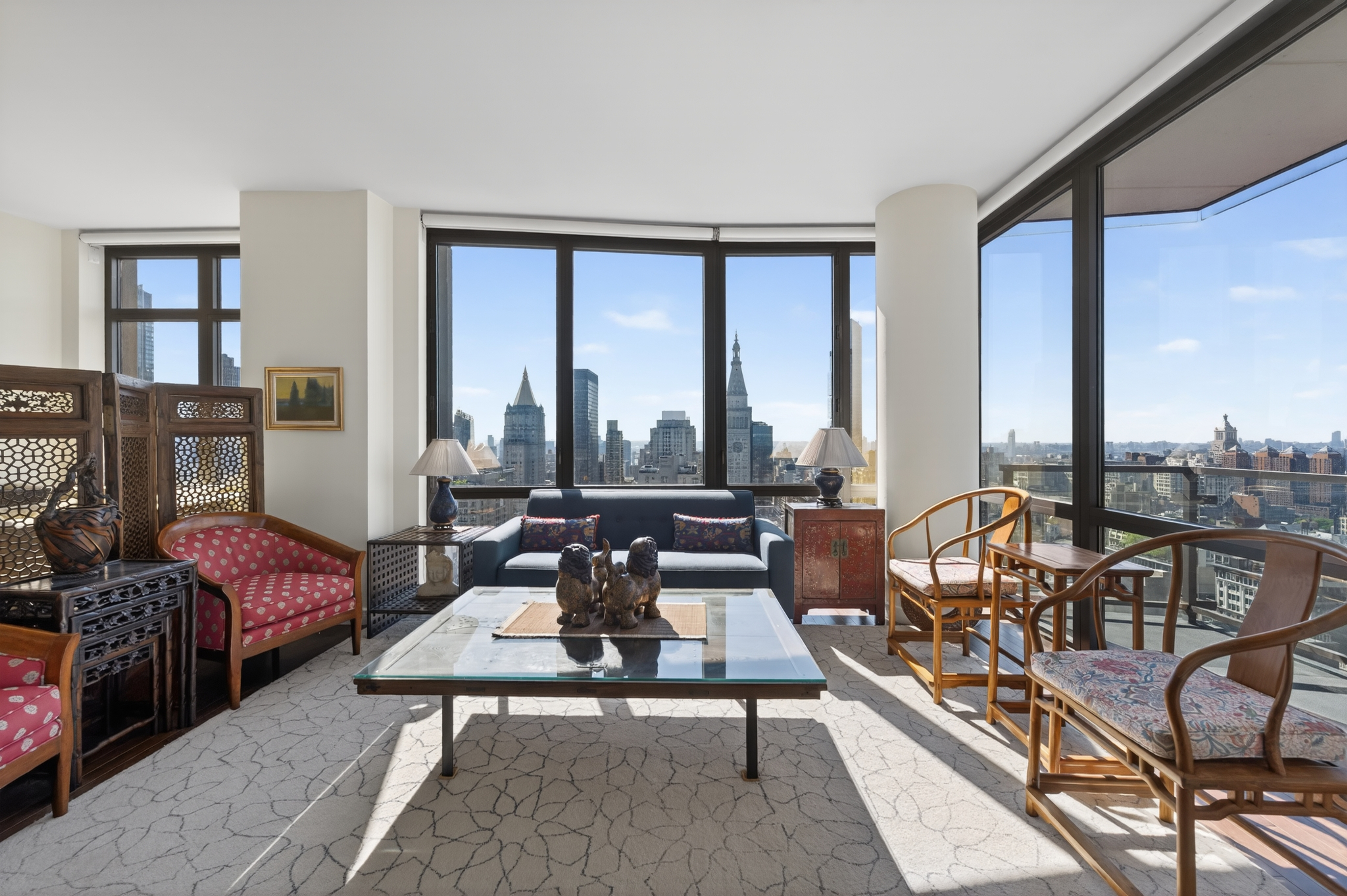 101 West 24th Street, Unit 36C Manhattan, NY 10011 - Photo 6 of 27 a living room with furniture and a floor to ceiling window