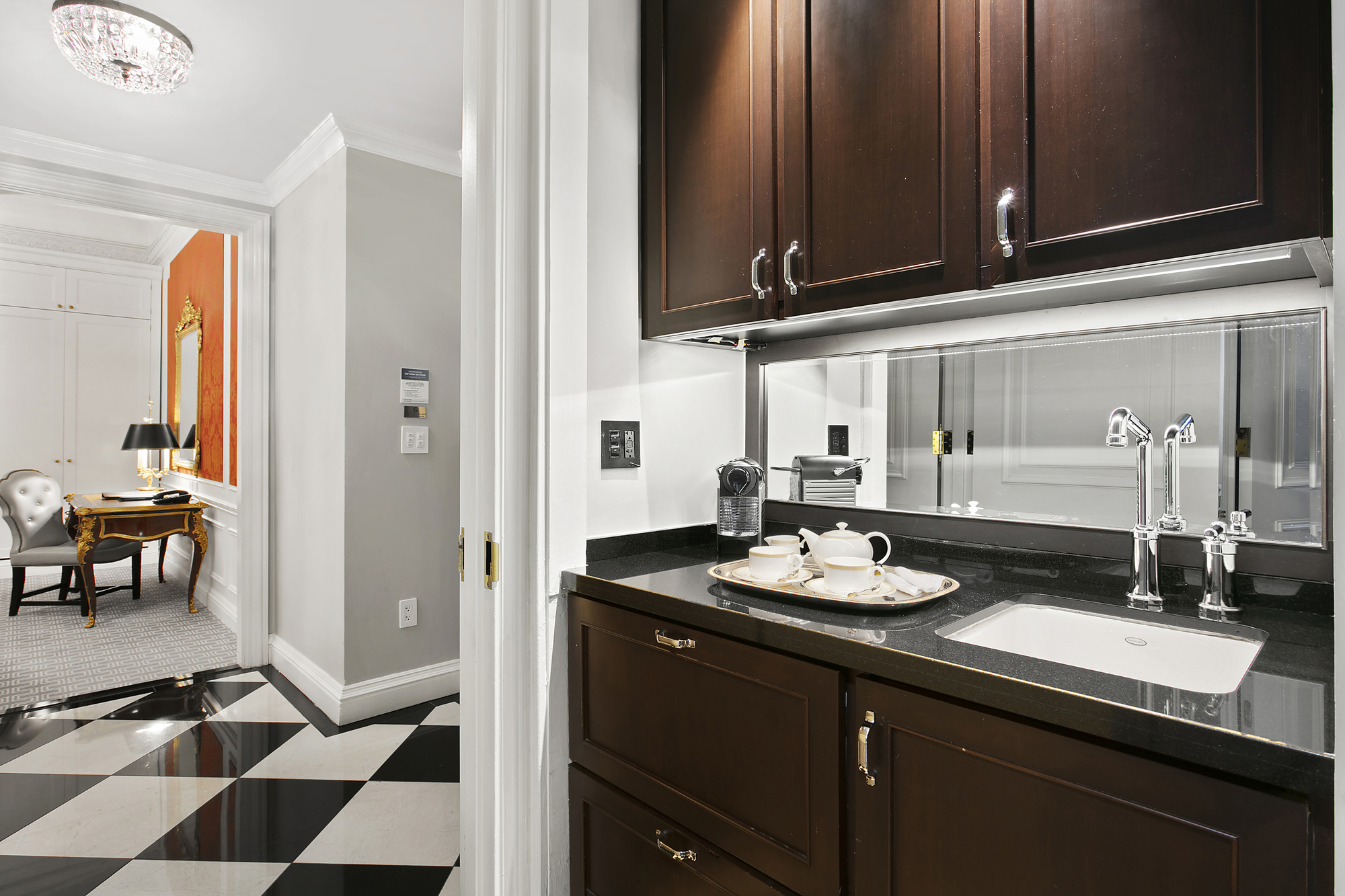 2 East 55th Street, Unit 918W17 Manhattan, NY 10022 - Photo 4 of 14 a bathroom with a sink and a mirror