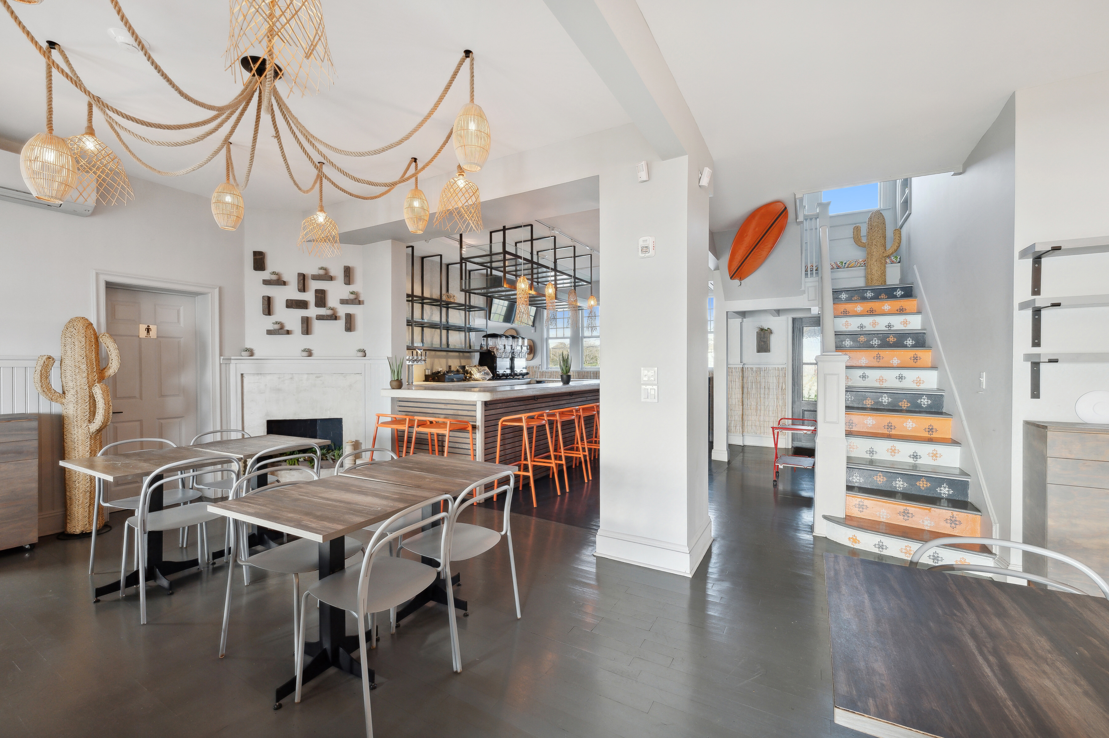 32 Lighthouse Road Hampton Bays, NY 11946 - Photo 21 of 51 a view of a dining room with furniture and wooden floor