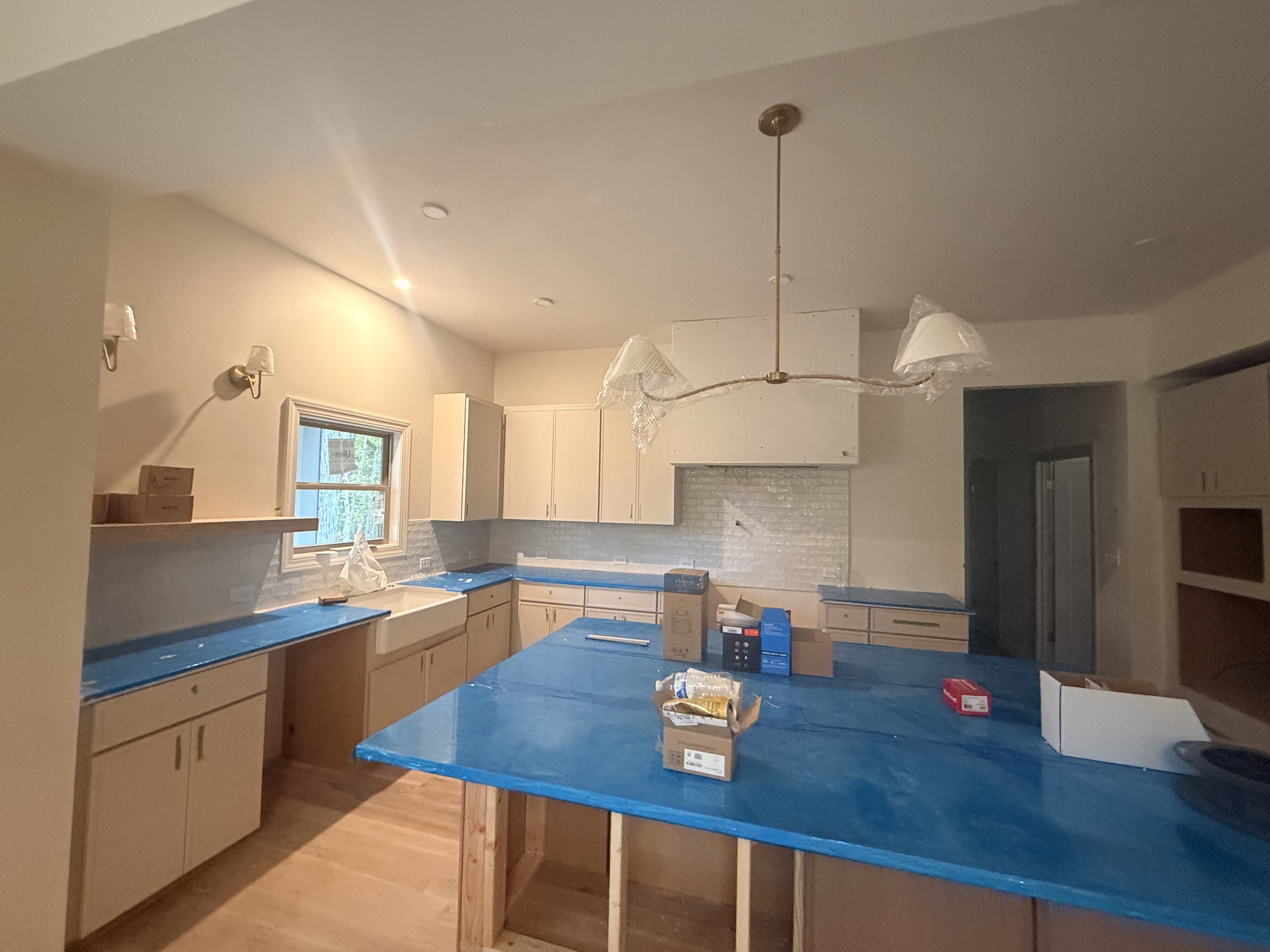 2949 Pace Road Clarksville, TN 37043 - Photo 7 of 18 a kitchen with stainless steel appliances granite countertop a sink dishwasher and cabinets with wooden floor