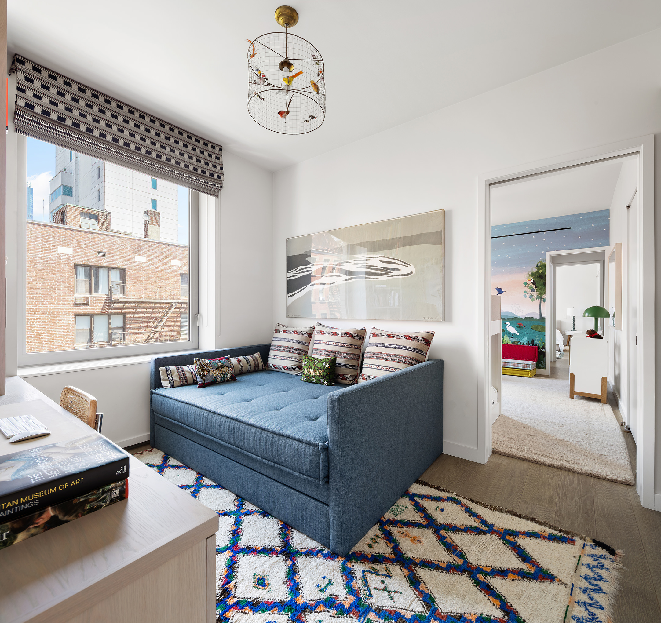 116 University Place, Unit 5 Manhattan, NY 10003 - Photo 14 of 21 a living room with furniture and a window