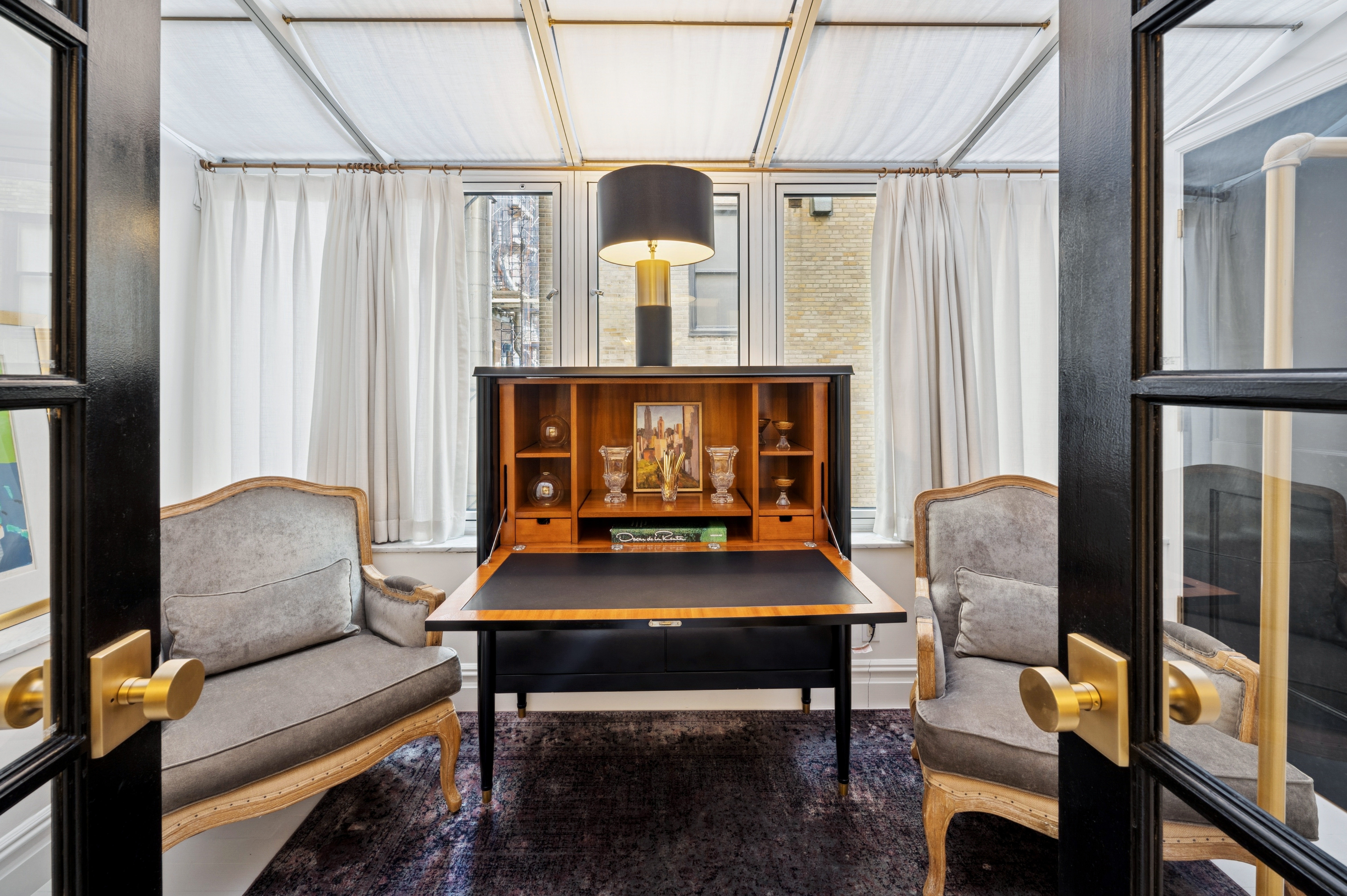 891 Park Avenue, Unit 10 Manhattan, NY 10075 - Photo 18 of 27 a living room with furniture and a window