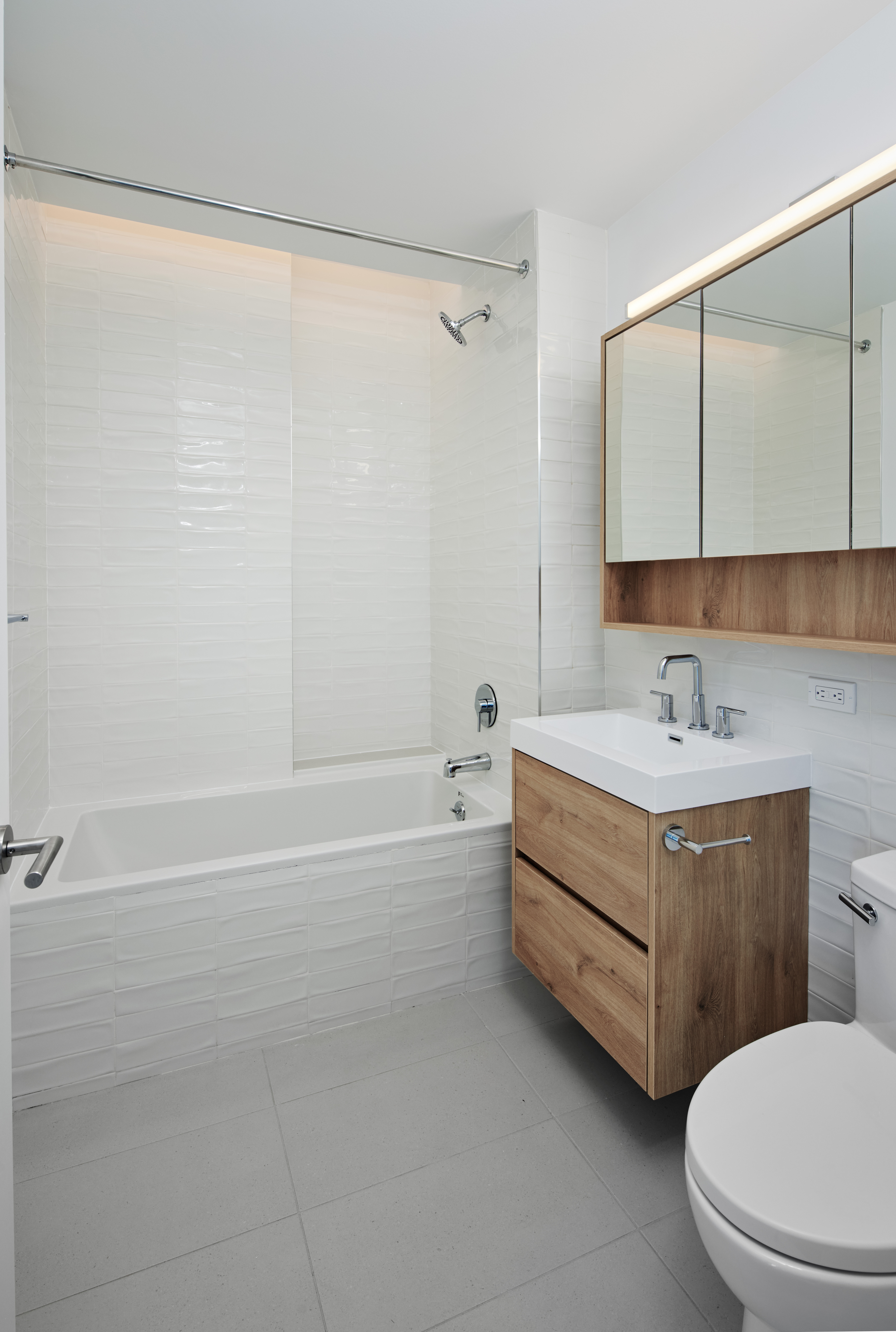 340 Lenox Road, Unit PHB Brooklyn, NY 11226 - Photo 6 of 26 a bathroom with a sink a toilet and shower