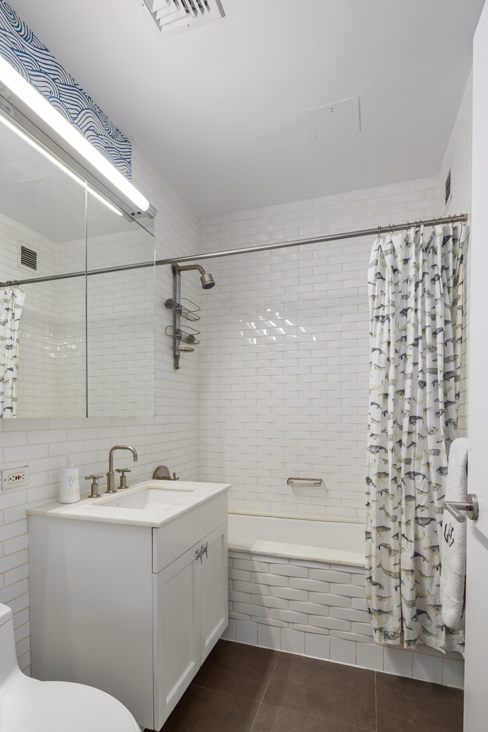 9 College Place, Unit 3A Brooklyn, NY 11201 - Photo 12 of 13 a bathroom with a sink a toilet and shower